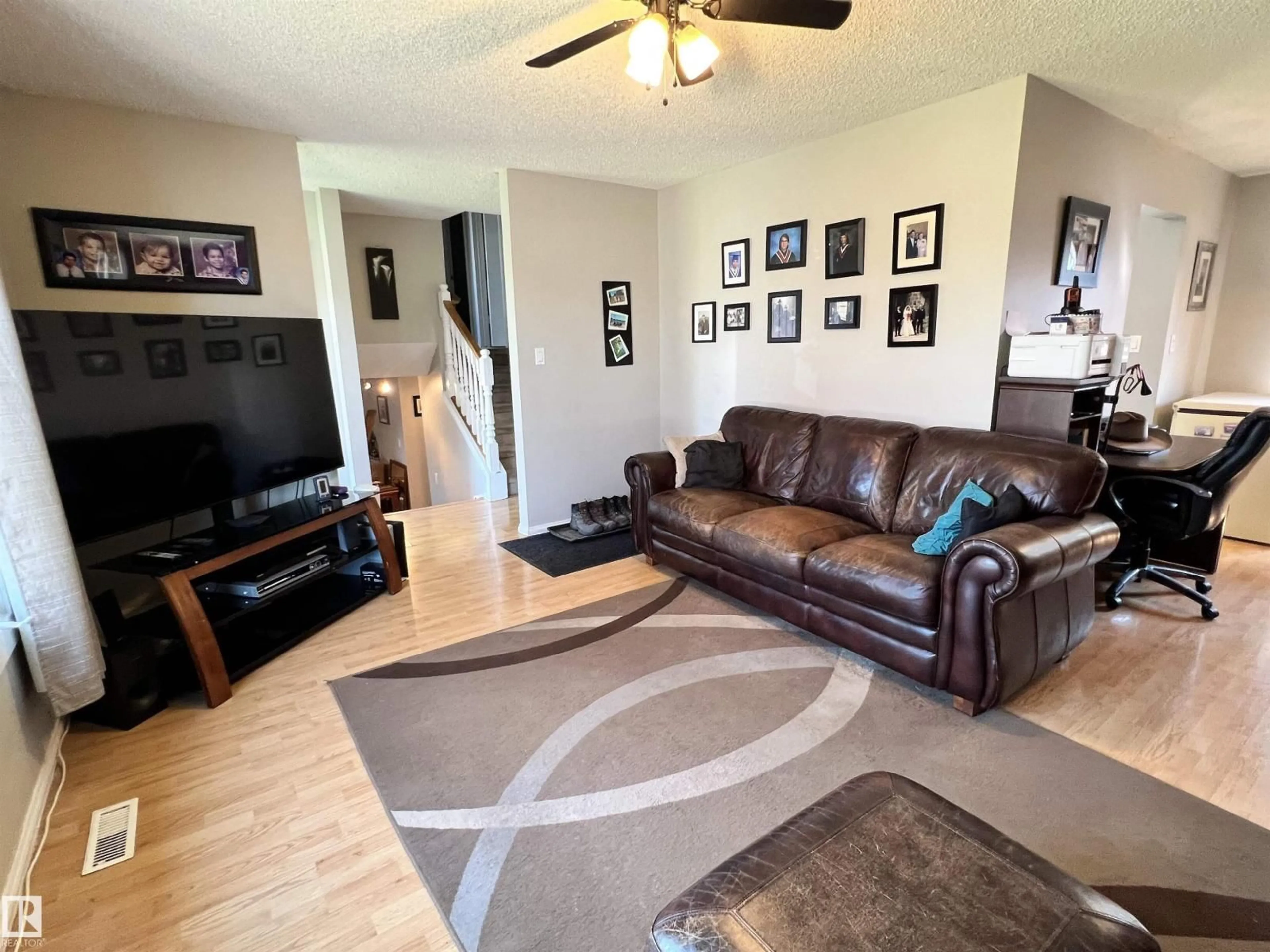Living room with furniture, unknown for 9305 97 AV, Morinville Alberta T8R1J2