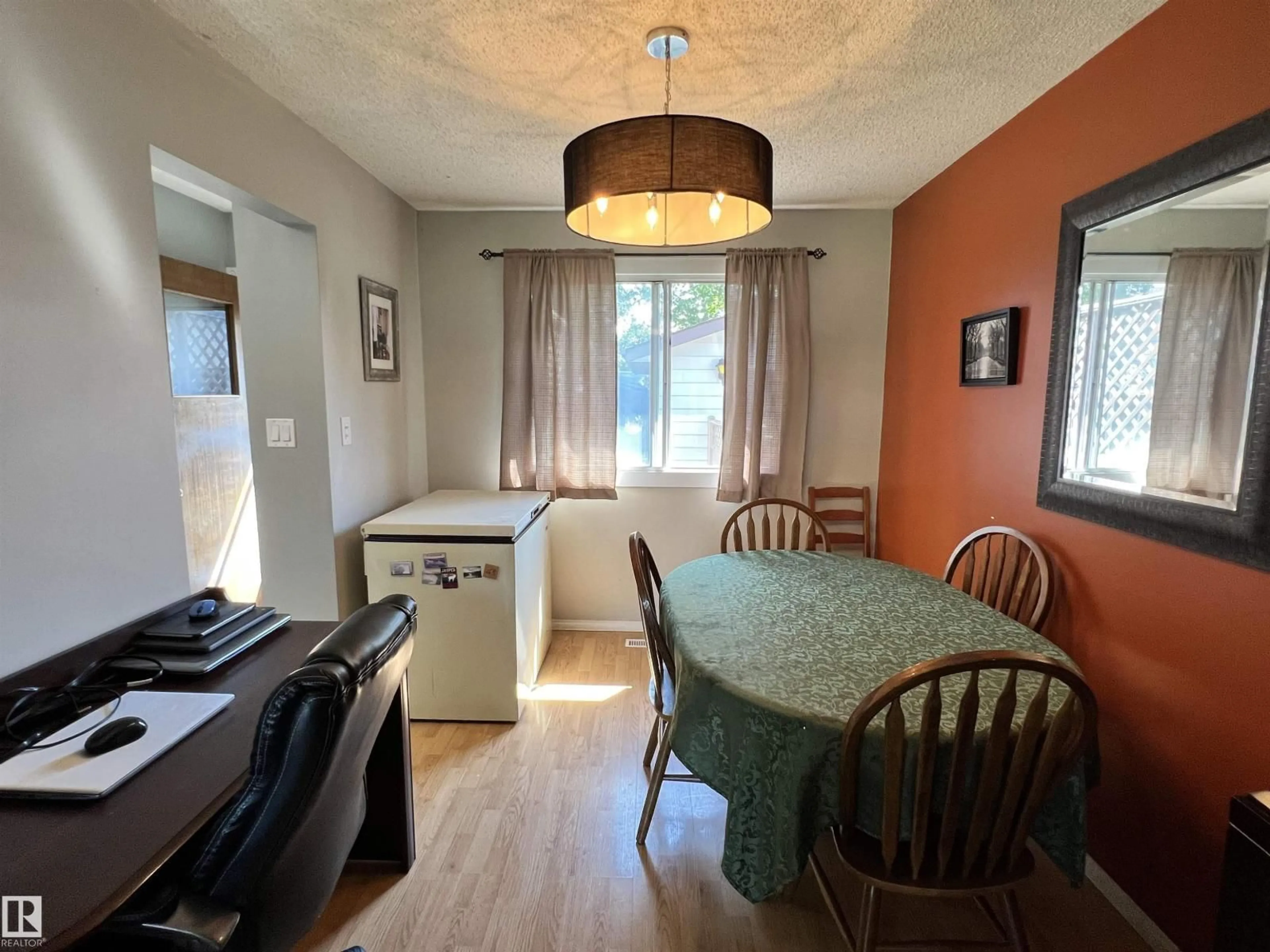 Dining room, wood/laminate floor for 9305 97 AV, Morinville Alberta T8R1J2