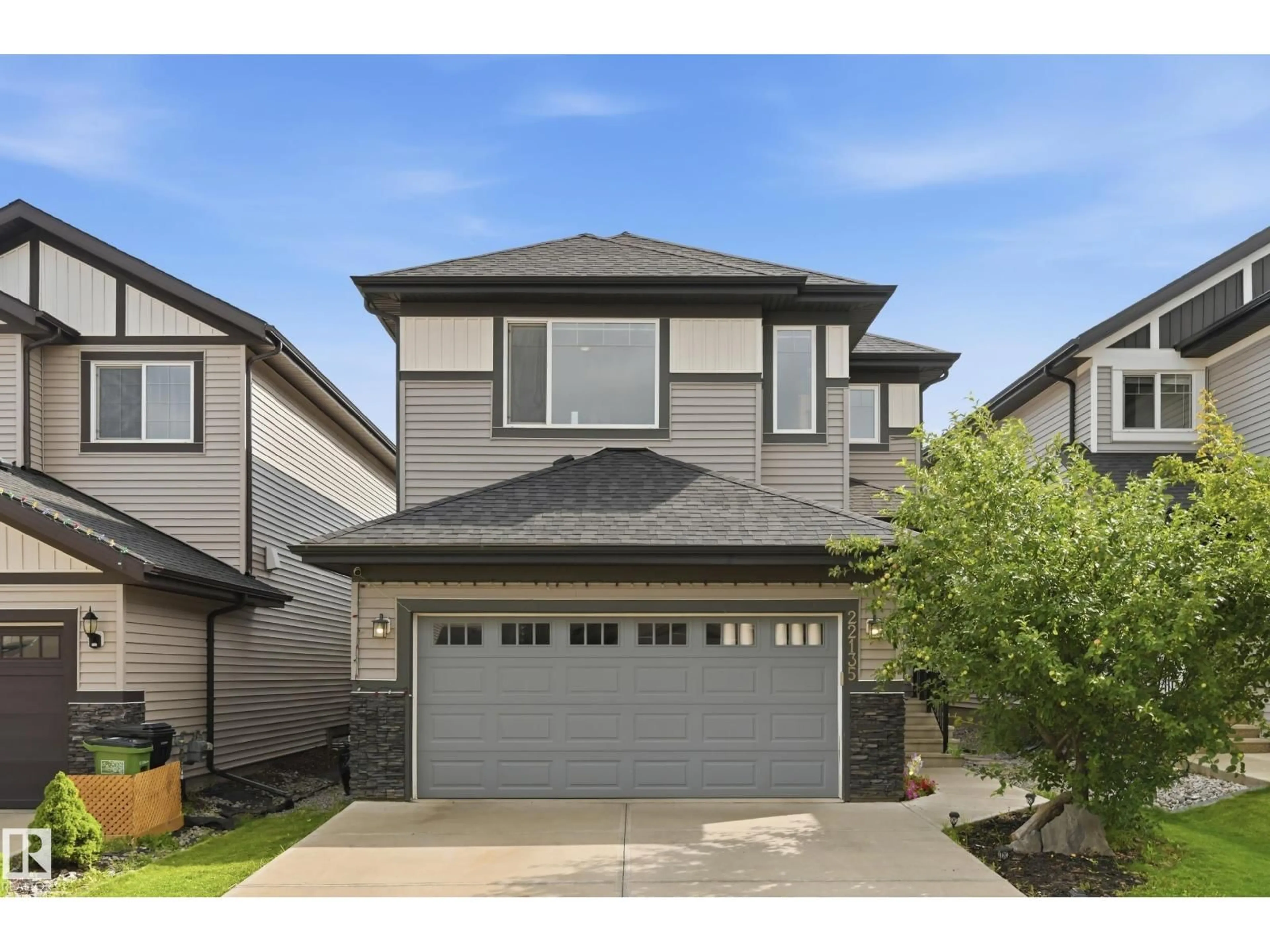 Home with vinyl exterior material, street for 22135 96 AV, Edmonton Alberta T5T7E5