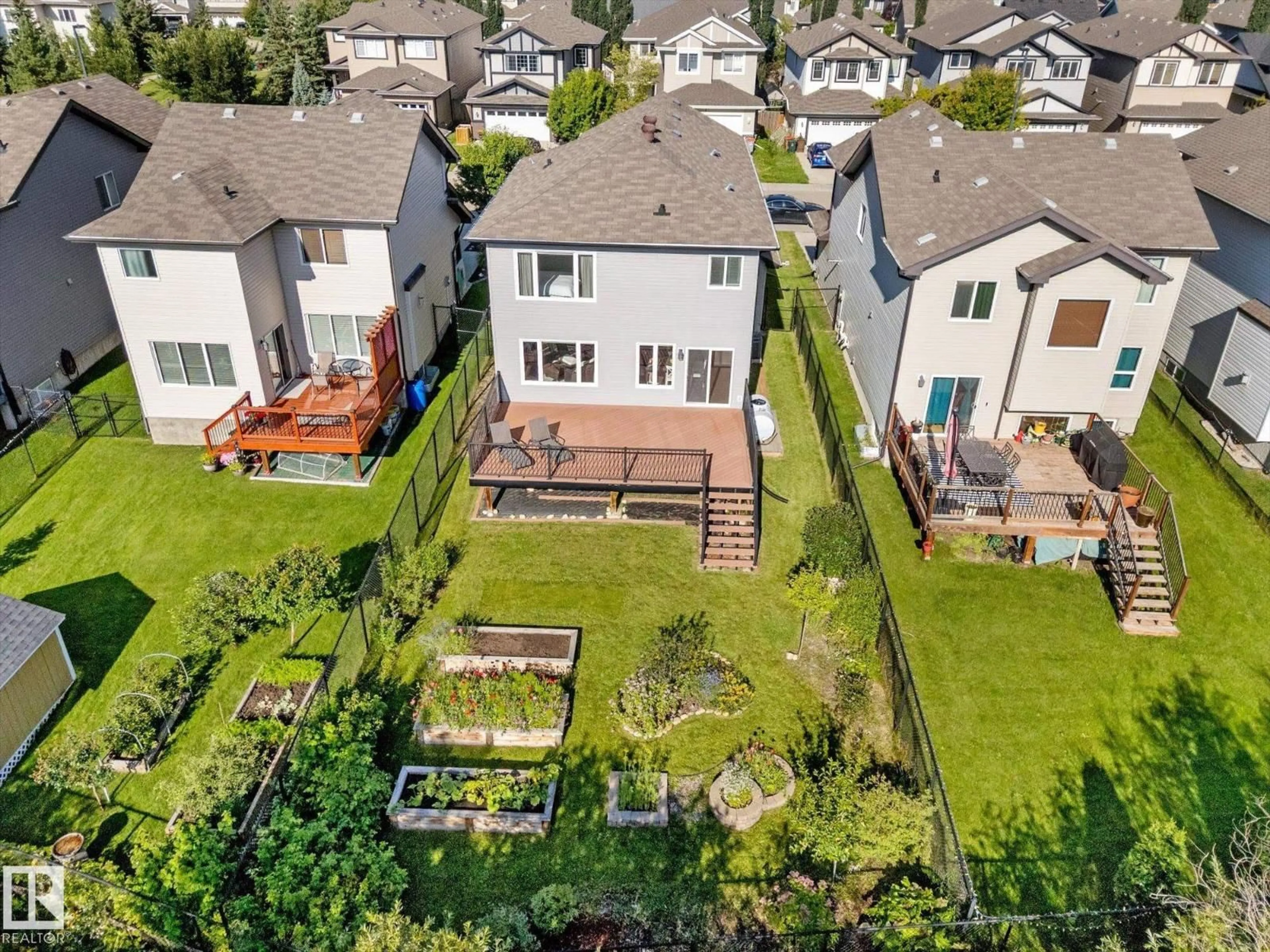 A pic from outside/outdoor area/front of a property/back of a property/a pic from drone, street for 1511 WESTERRA BN, Stony Plain Alberta T7Z0B3