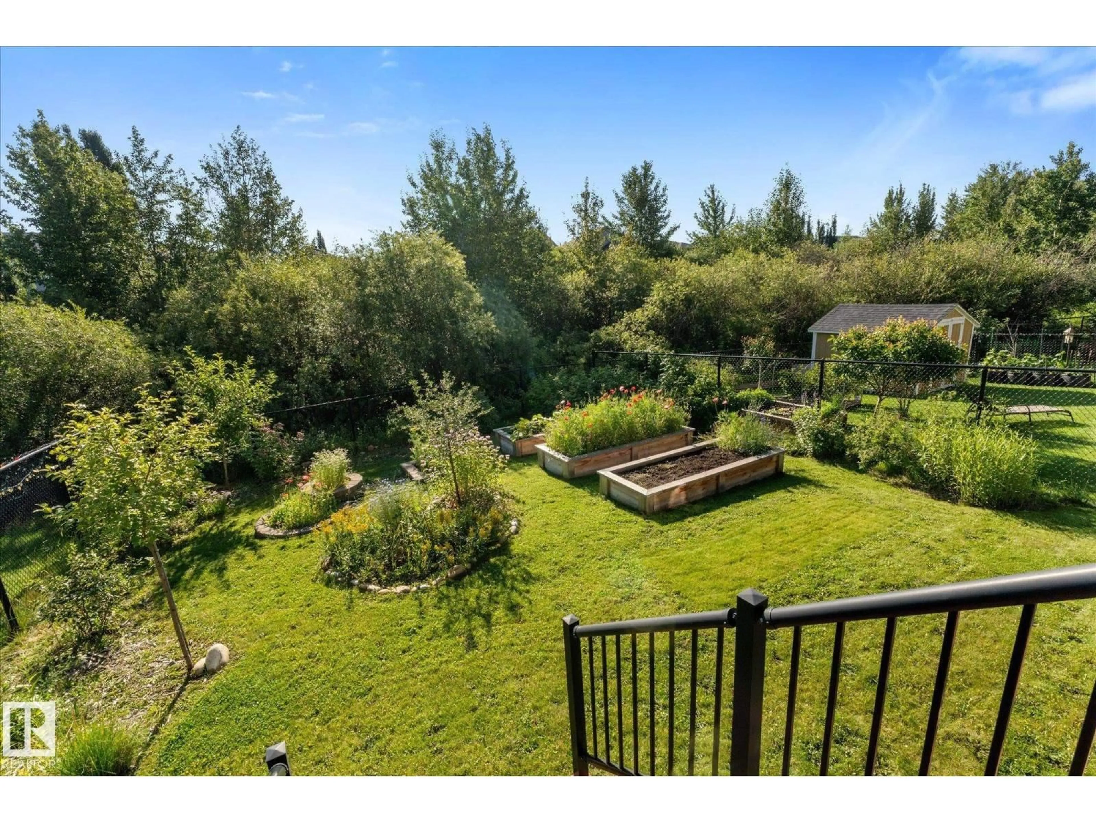 A pic from outside/outdoor area/front of a property/back of a property/a pic from drone, forest/trees view for 1511 WESTERRA BN, Stony Plain Alberta T7Z0B3