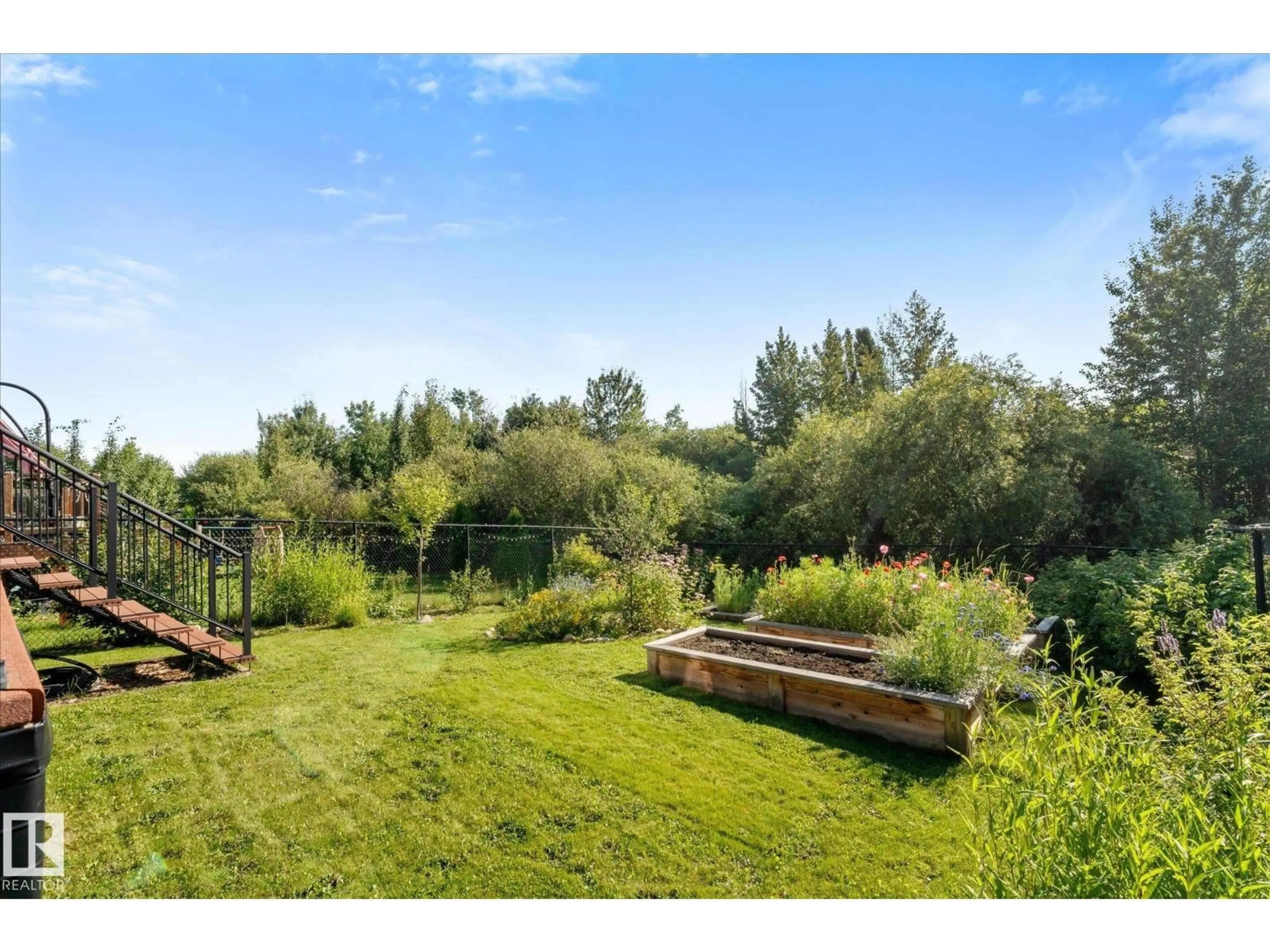 A pic from outside/outdoor area/front of a property/back of a property/a pic from drone, water/lake/river/ocean view for 1511 WESTERRA BN, Stony Plain Alberta T7Z0B3