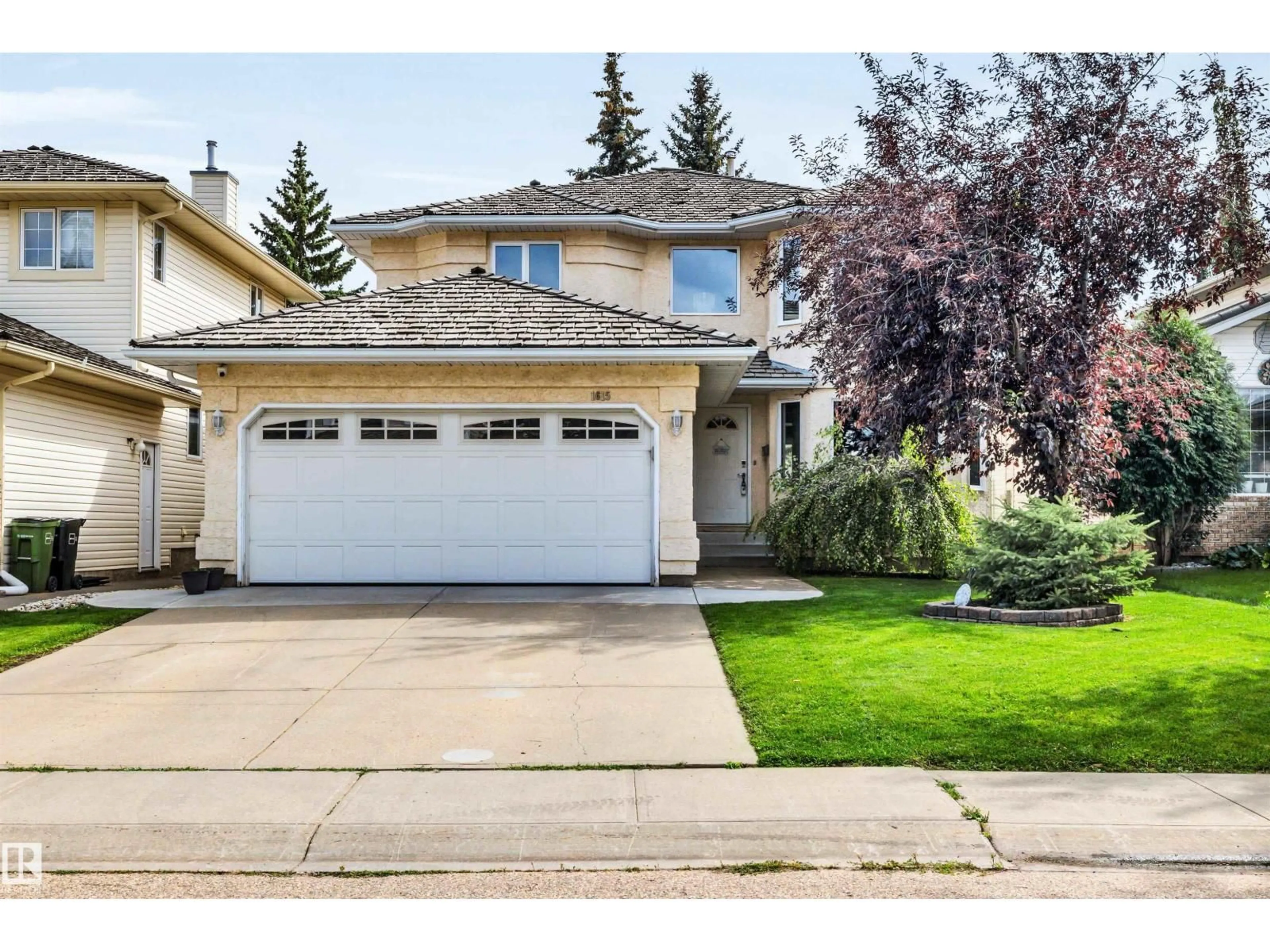 Home with vinyl exterior material, street for 1615 WELBOURN CV, Edmonton Alberta T6M2M5