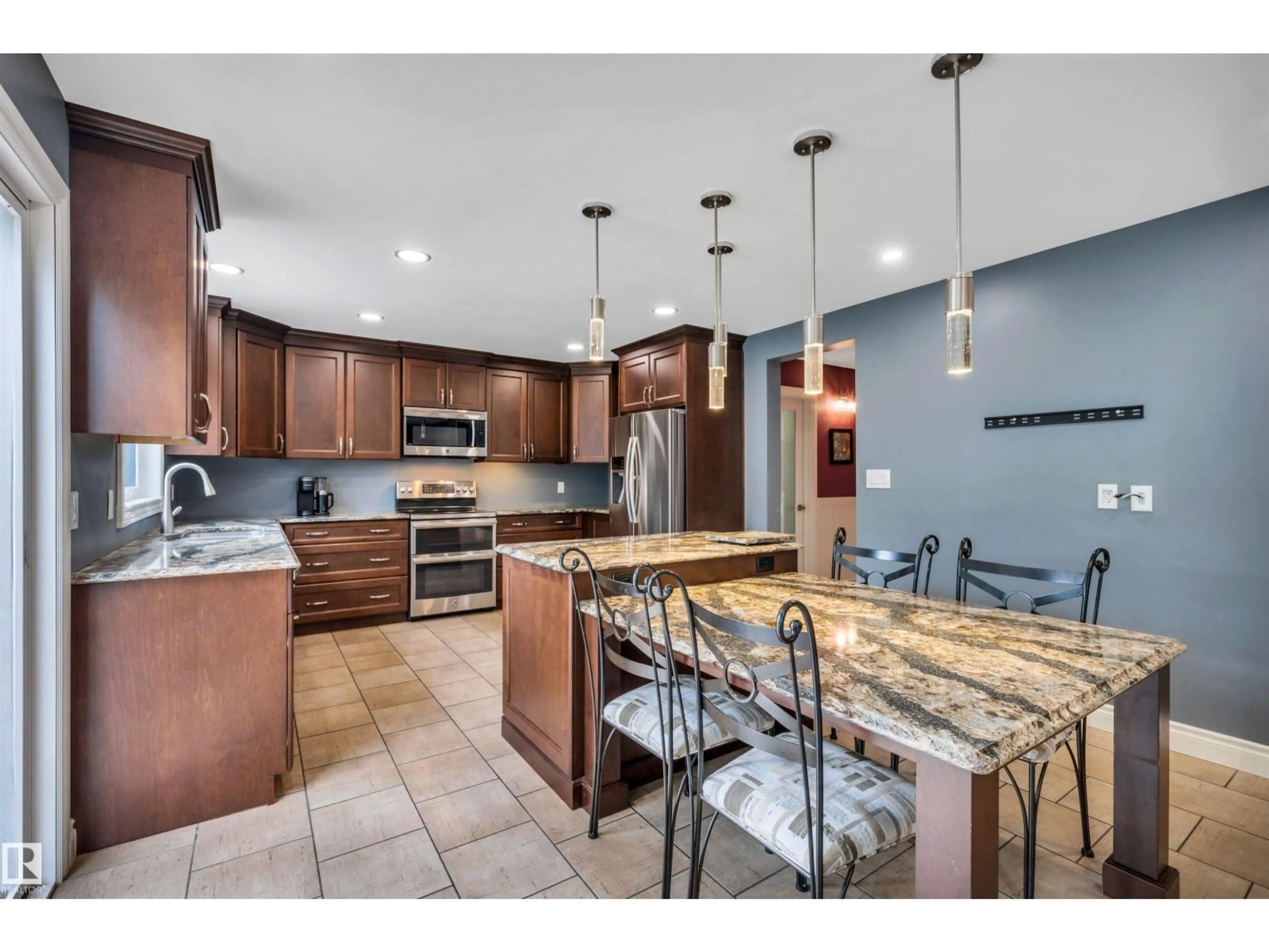 Open concept kitchen, ceramic/tile floor for 1615 WELBOURN CV, Edmonton Alberta T6M2M5