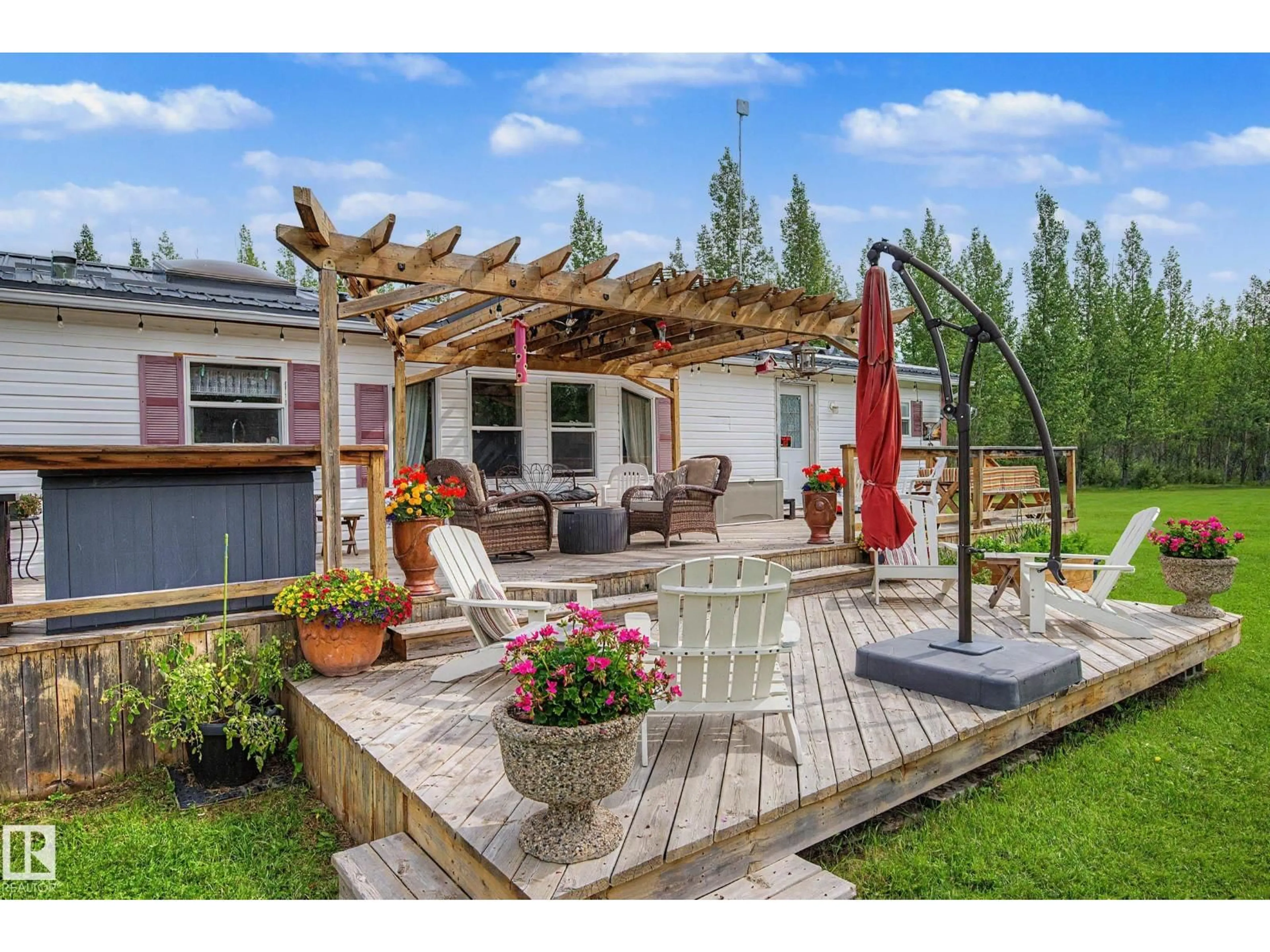 Patio, water/lake/river/ocean view for 3025A TWP ROAD 562, Rural Lac Ste. Anne County Alberta T0E1A0