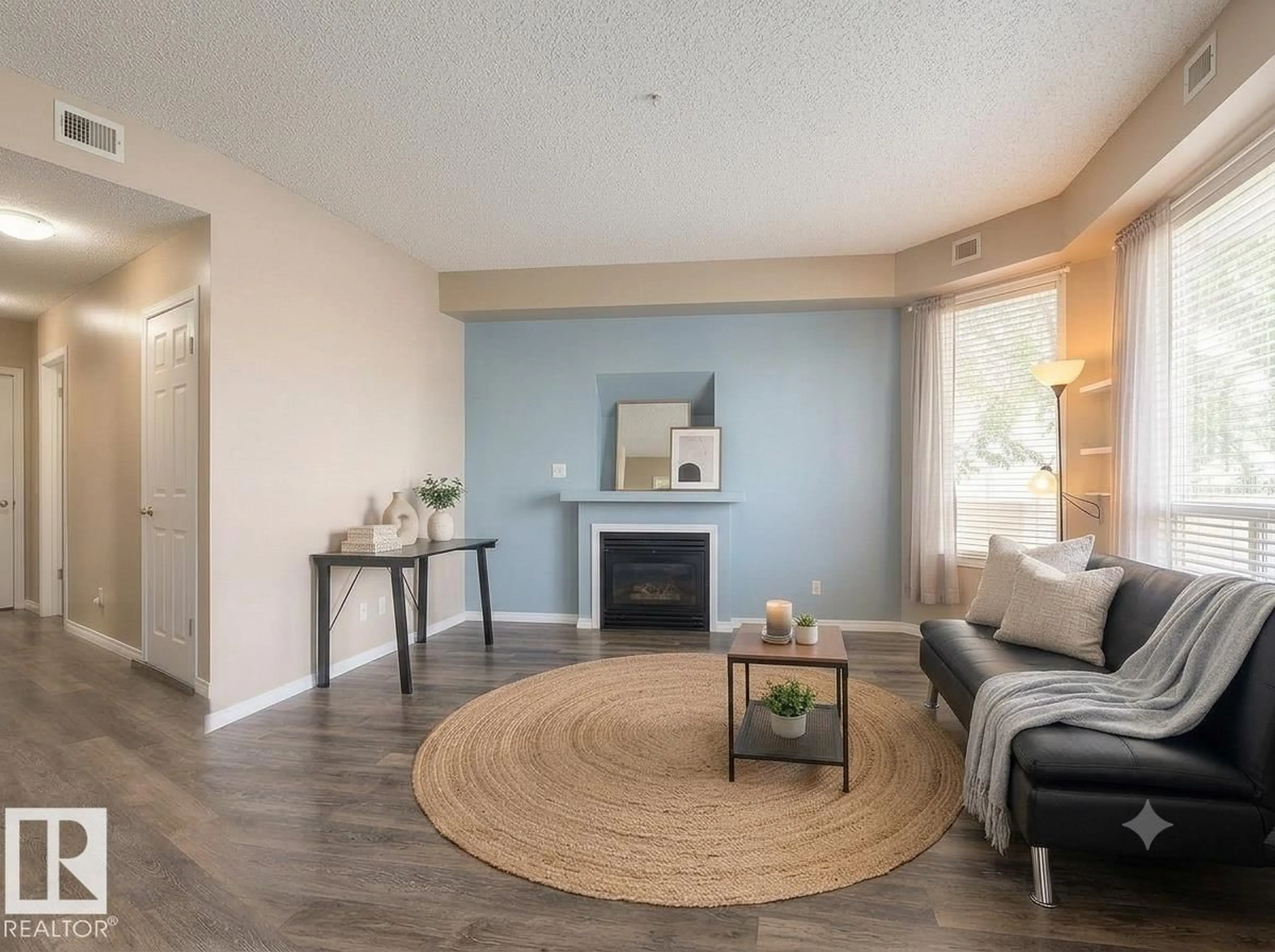 Living room with furniture, wood/laminate floor for #103 - 8108 109 ST, Edmonton Alberta T6G2V7