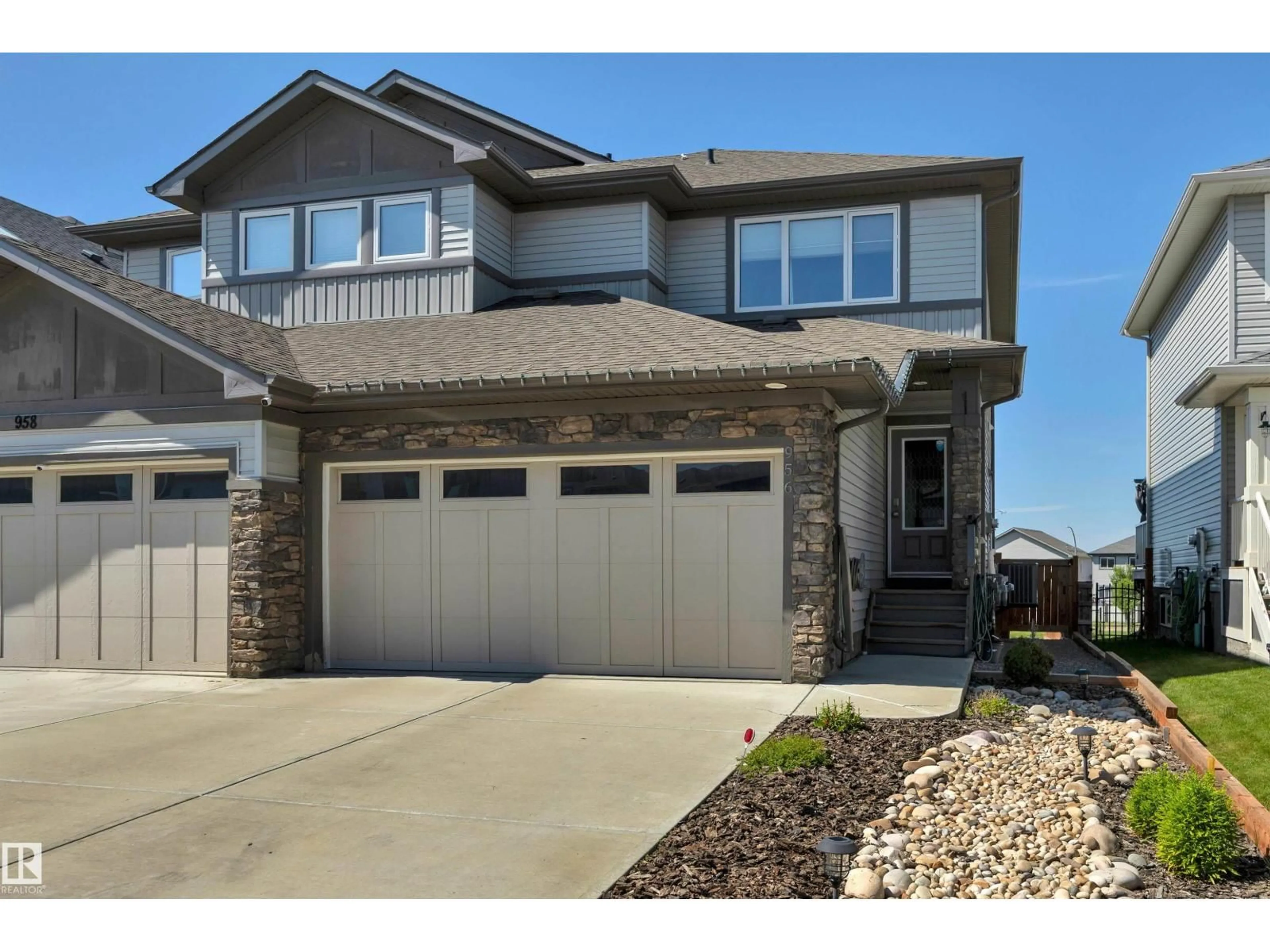 Home with vinyl exterior material, street for 956 MORRIS WY, Leduc Alberta T9E1G1