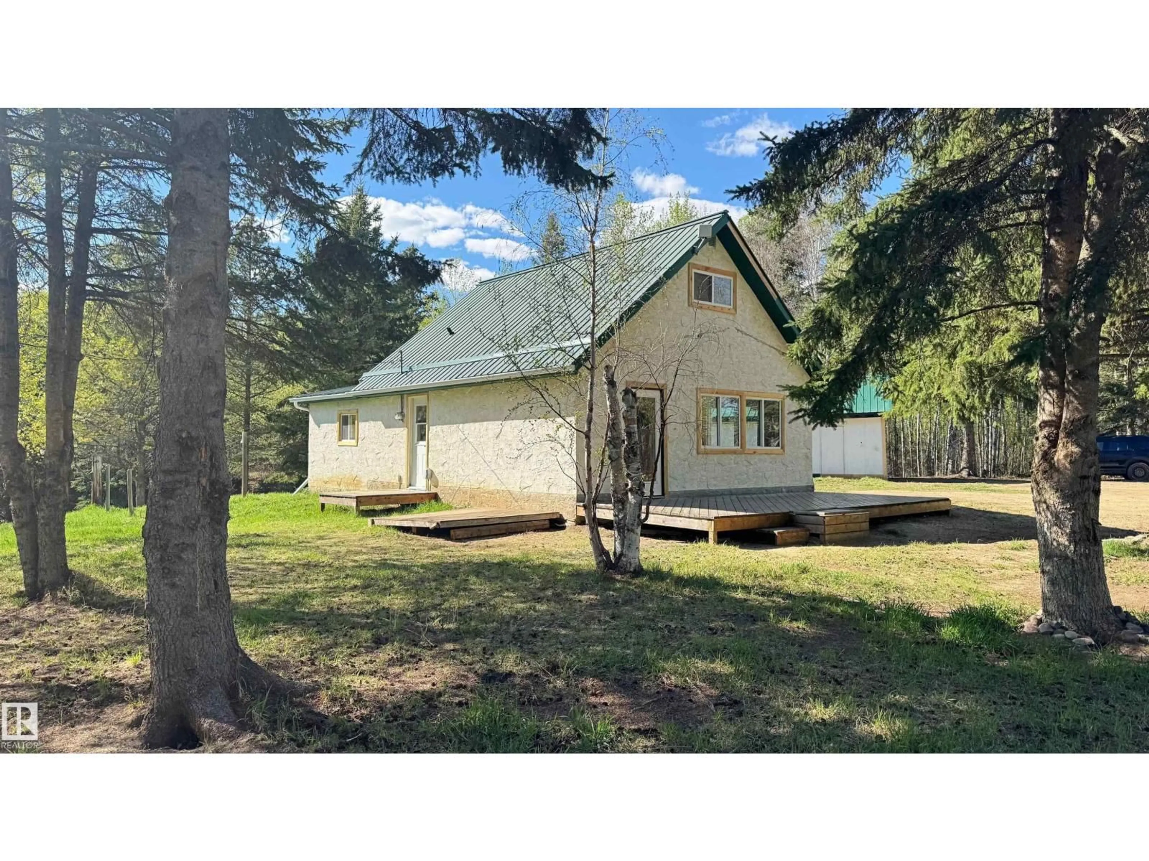 A pic from outside/outdoor area/front of a property/back of a property/a pic from drone, unknown for 620076B HWY 661, Rural Woodlands County Alberta T0G1A0