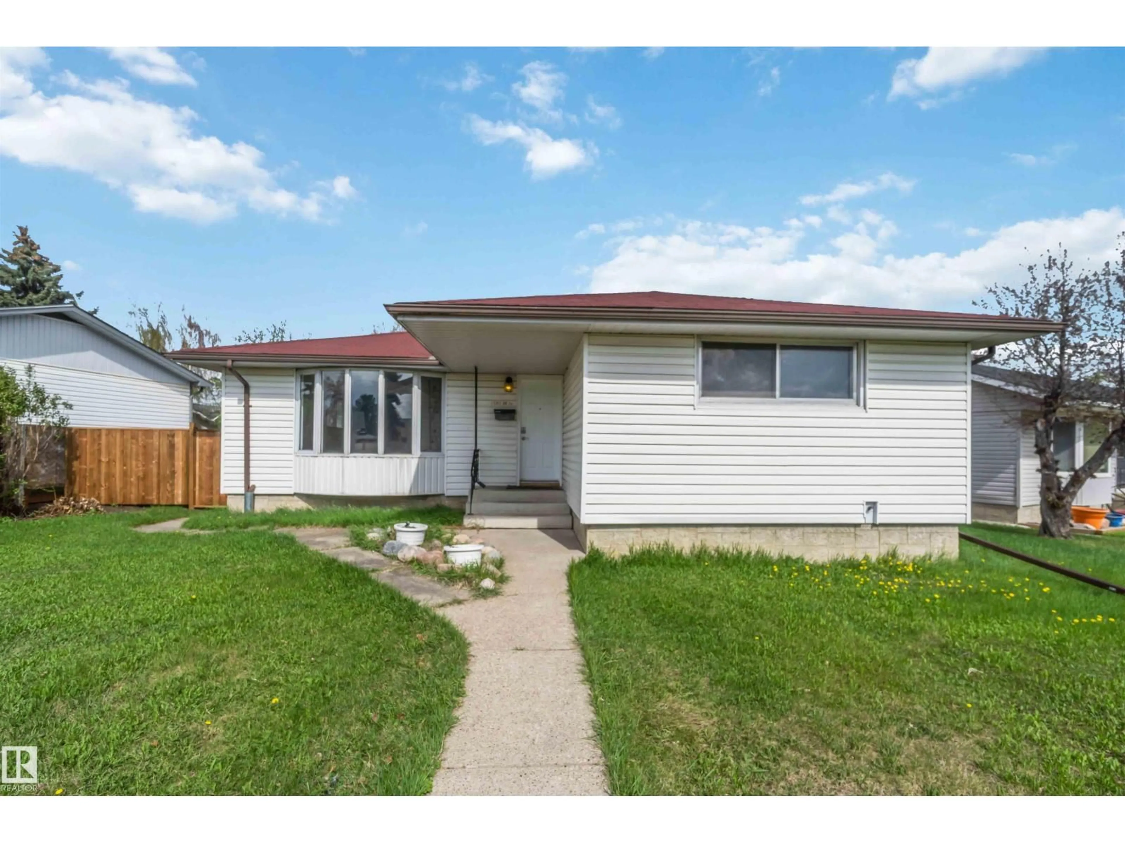 Home with vinyl exterior material, street for NW - 13303 58 ST, Edmonton Alberta T5A0P9