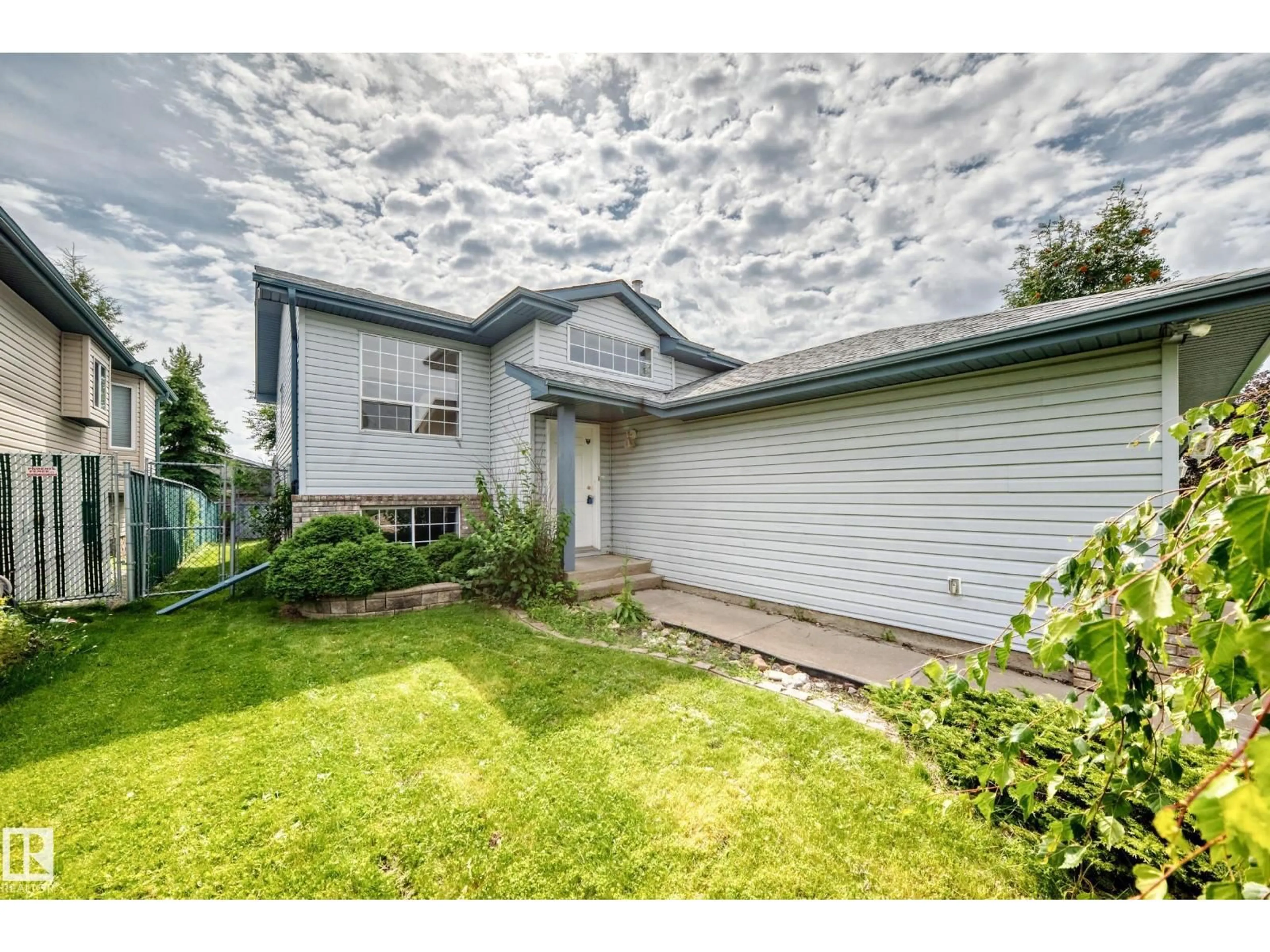 A pic from outside/outdoor area/front of a property/back of a property/a pic from drone, street for 3035 134 AV, Edmonton Alberta T5A5C3