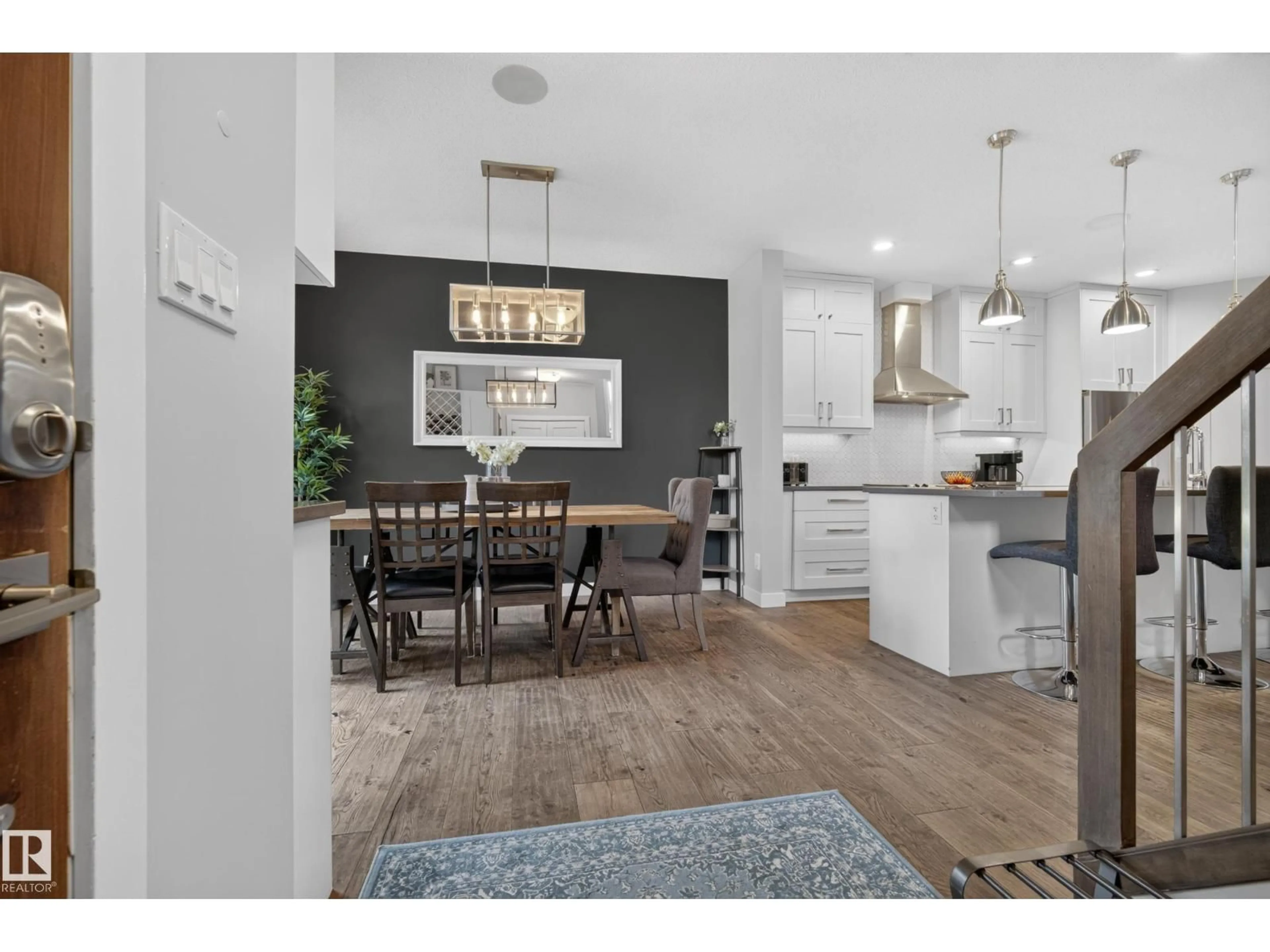 Open concept kitchen, wood/laminate floor for NW - 11018 122 ST, Edmonton Alberta T5M0B3