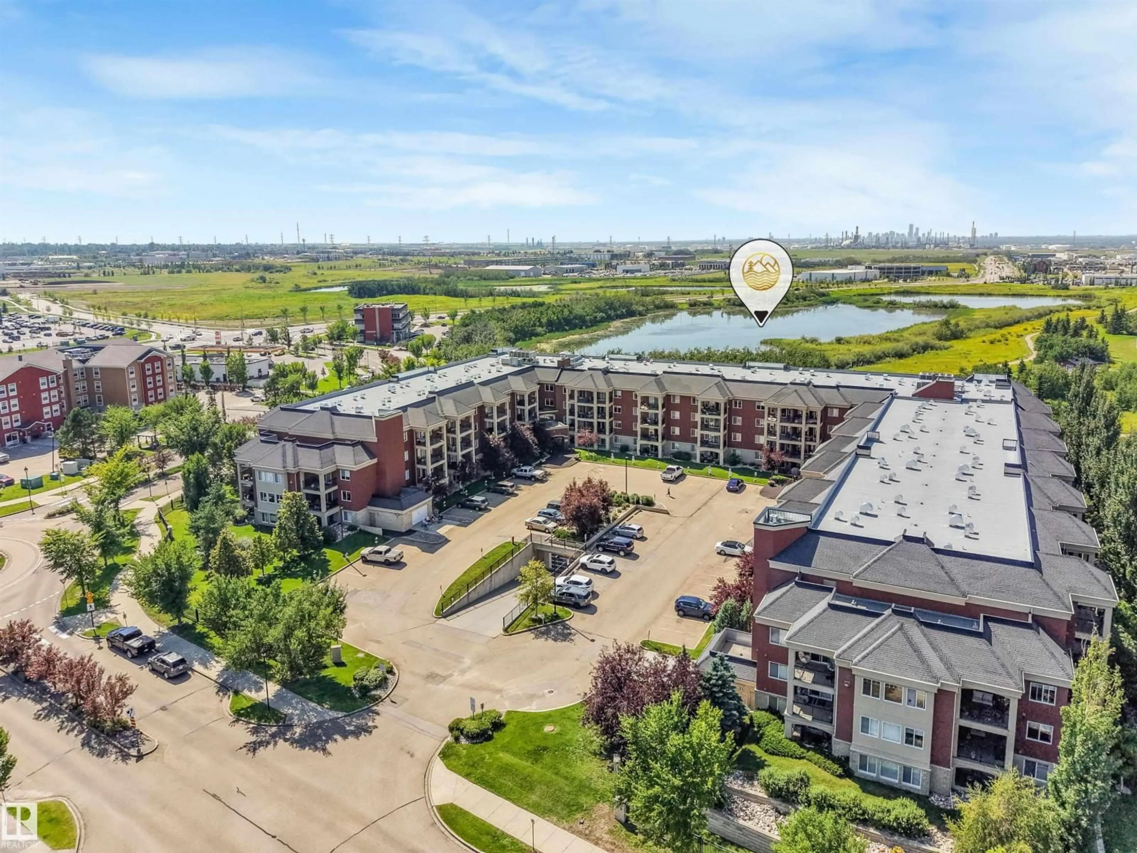A pic from outside/outdoor area/front of a property/back of a property/a pic from drone, water/lake/river/ocean view for 300 - 326 PALISADES WY, Sherwood Park Alberta T8H2T9