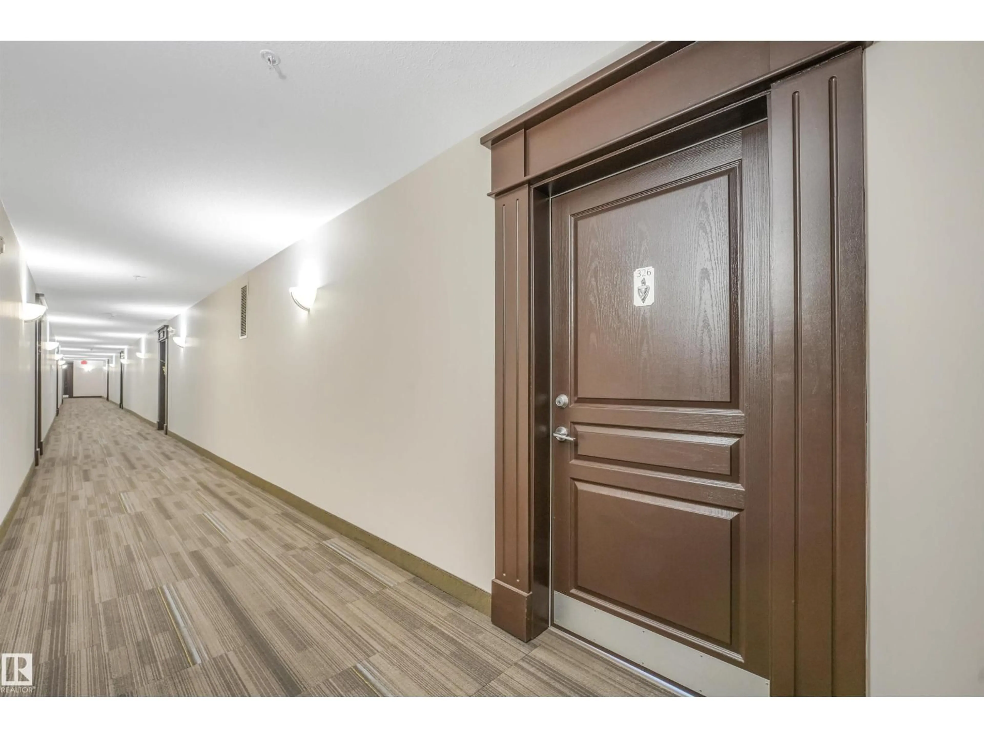 Indoor foyer for 300 - 326 PALISADES WY, Sherwood Park Alberta T8H2T9