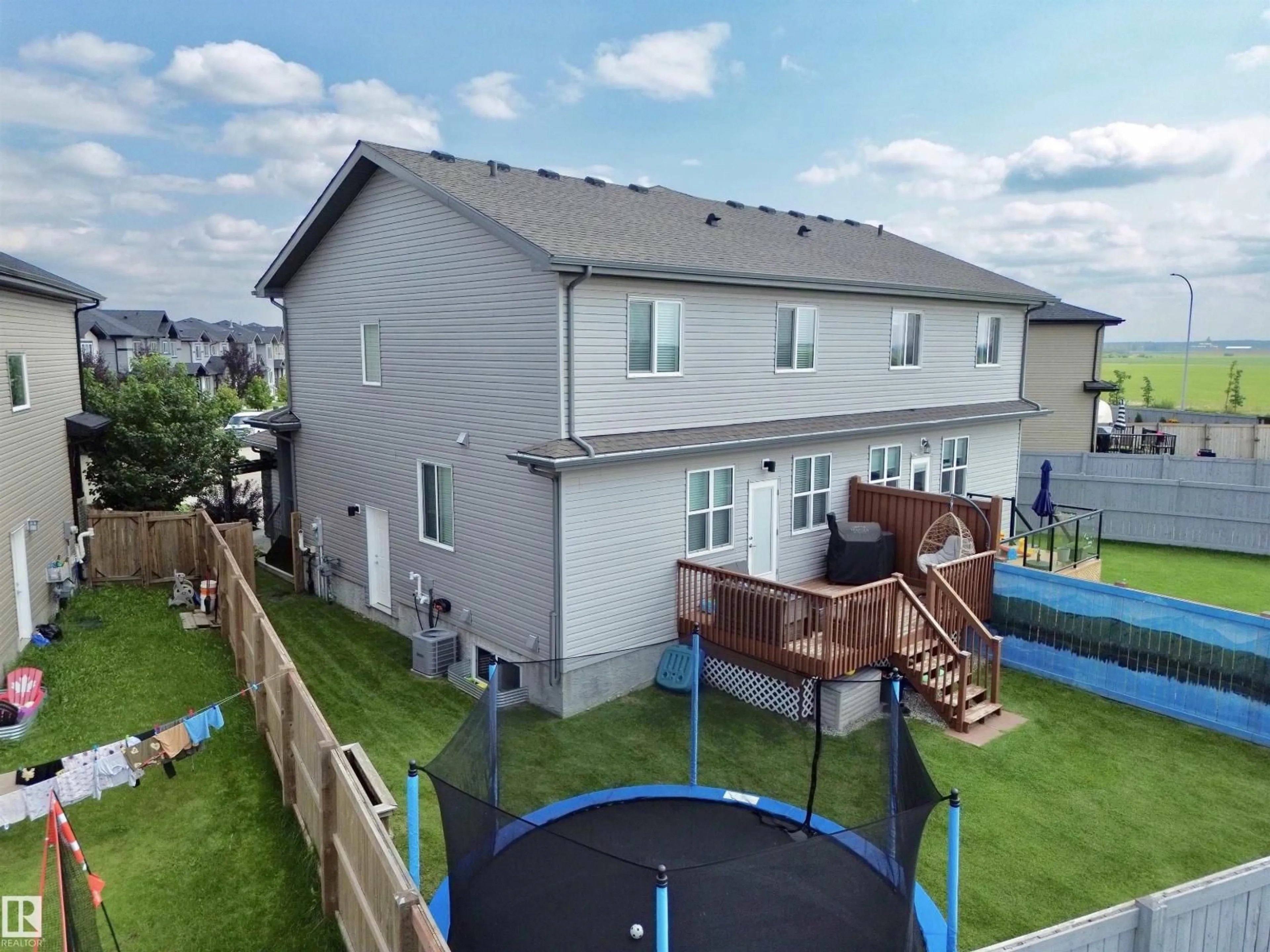 A pic from outside/outdoor area/front of a property/back of a property/a pic from drone, unknown for 127 RICHMOND LI, Fort Saskatchewan Alberta T8L0S6