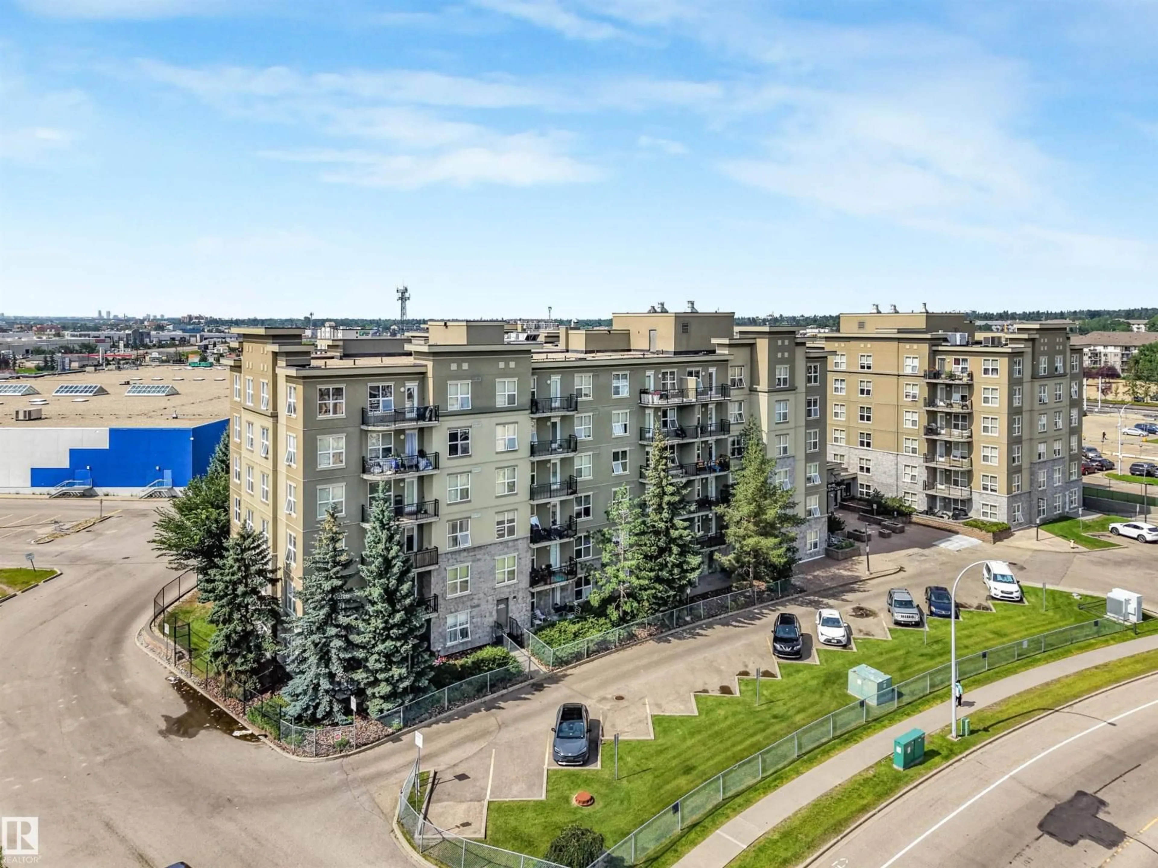 A pic from outside/outdoor area/front of a property/back of a property/a pic from drone, city buildings view from balcony for #2-208 - 4245 139 AV, Edmonton Alberta T5Y3E8