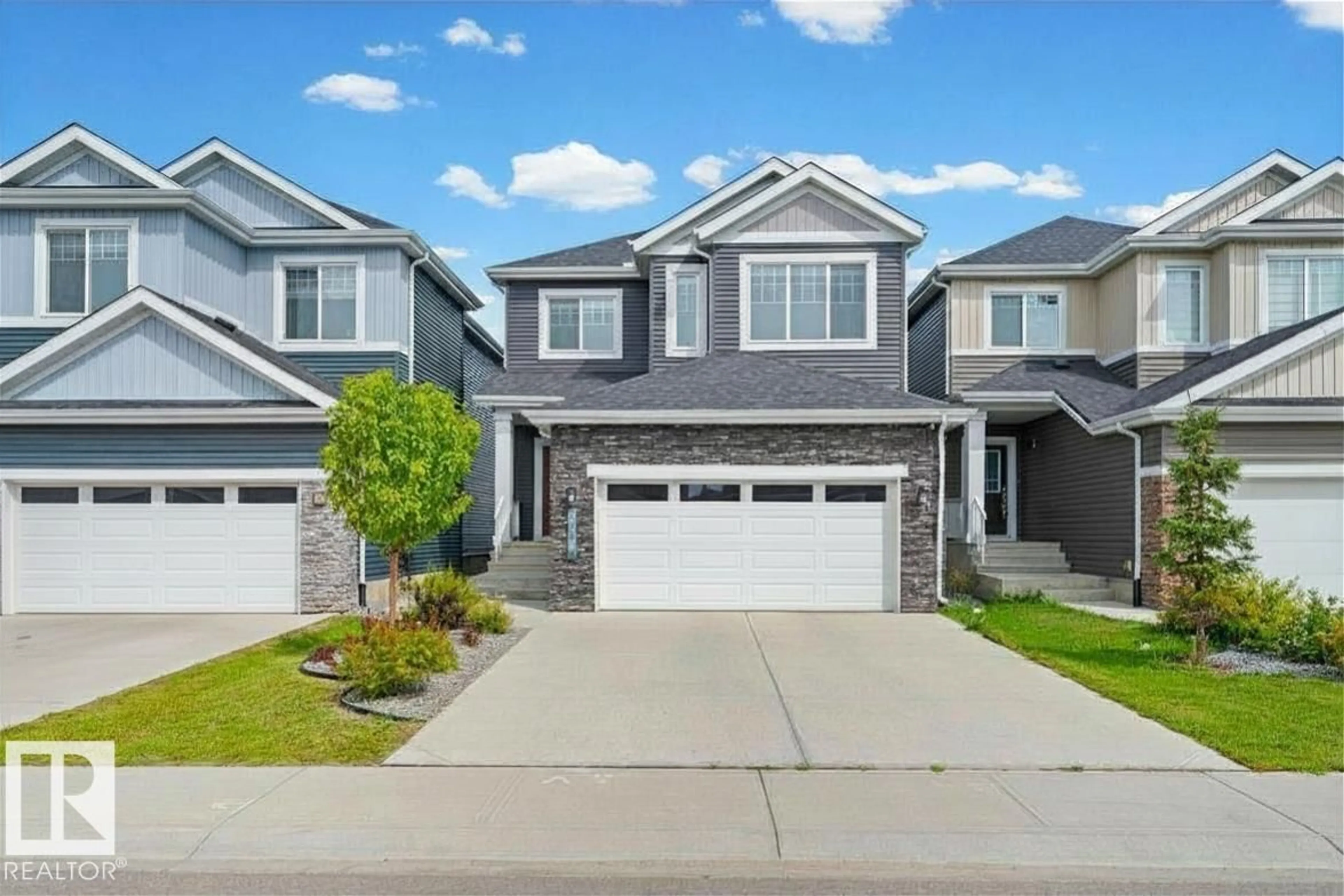 Home with vinyl exterior material, street for SW - 16128 31 AV, Edmonton Alberta T6W4X2