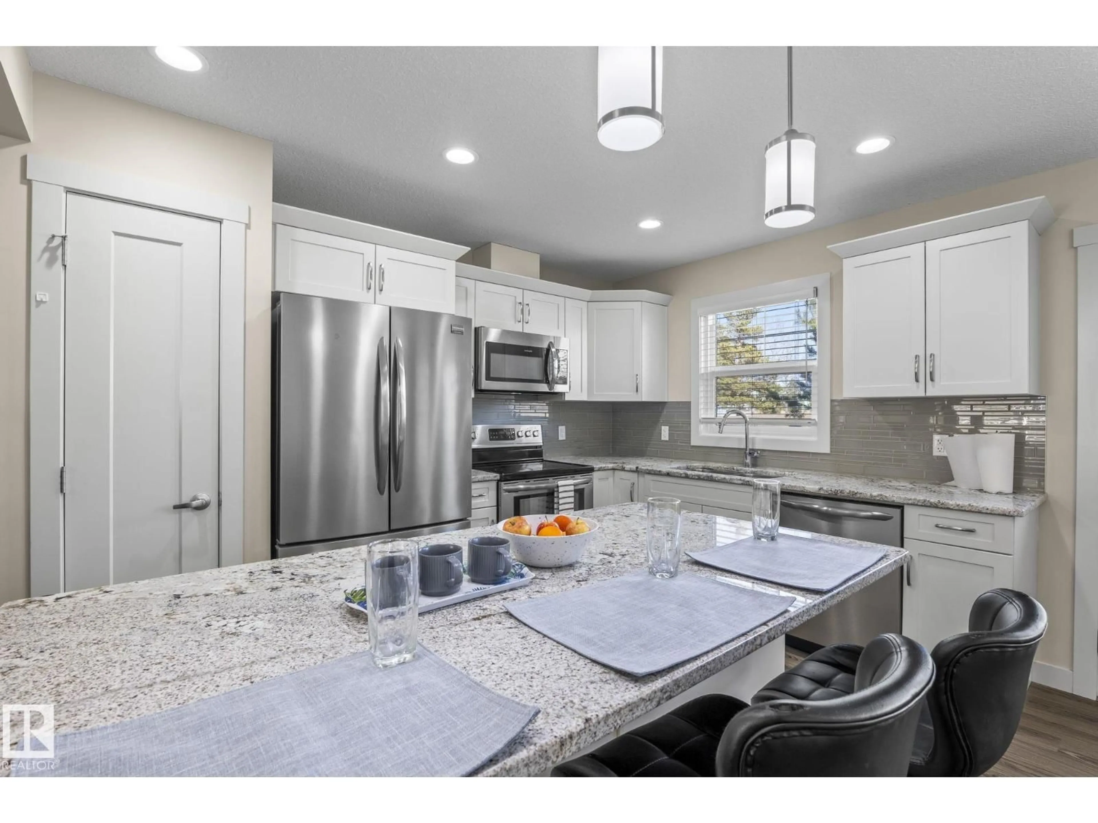 Open concept kitchen, ceramic/tile floor for #24 - 4205 30 ST, Edmonton Alberta T6T2G9