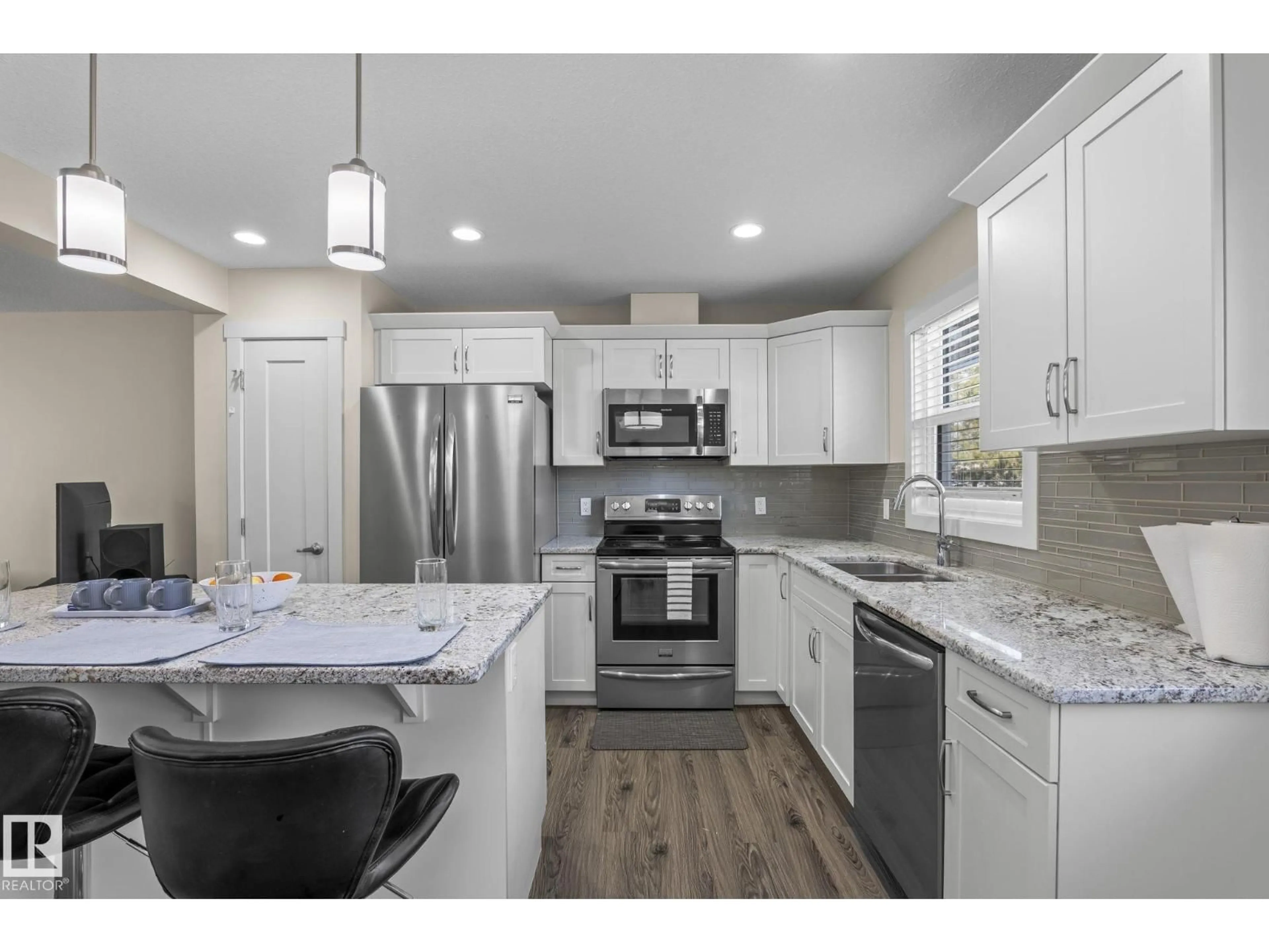 Open concept kitchen, ceramic/tile floor for #24 - 4205 30 ST, Edmonton Alberta T6T2G9