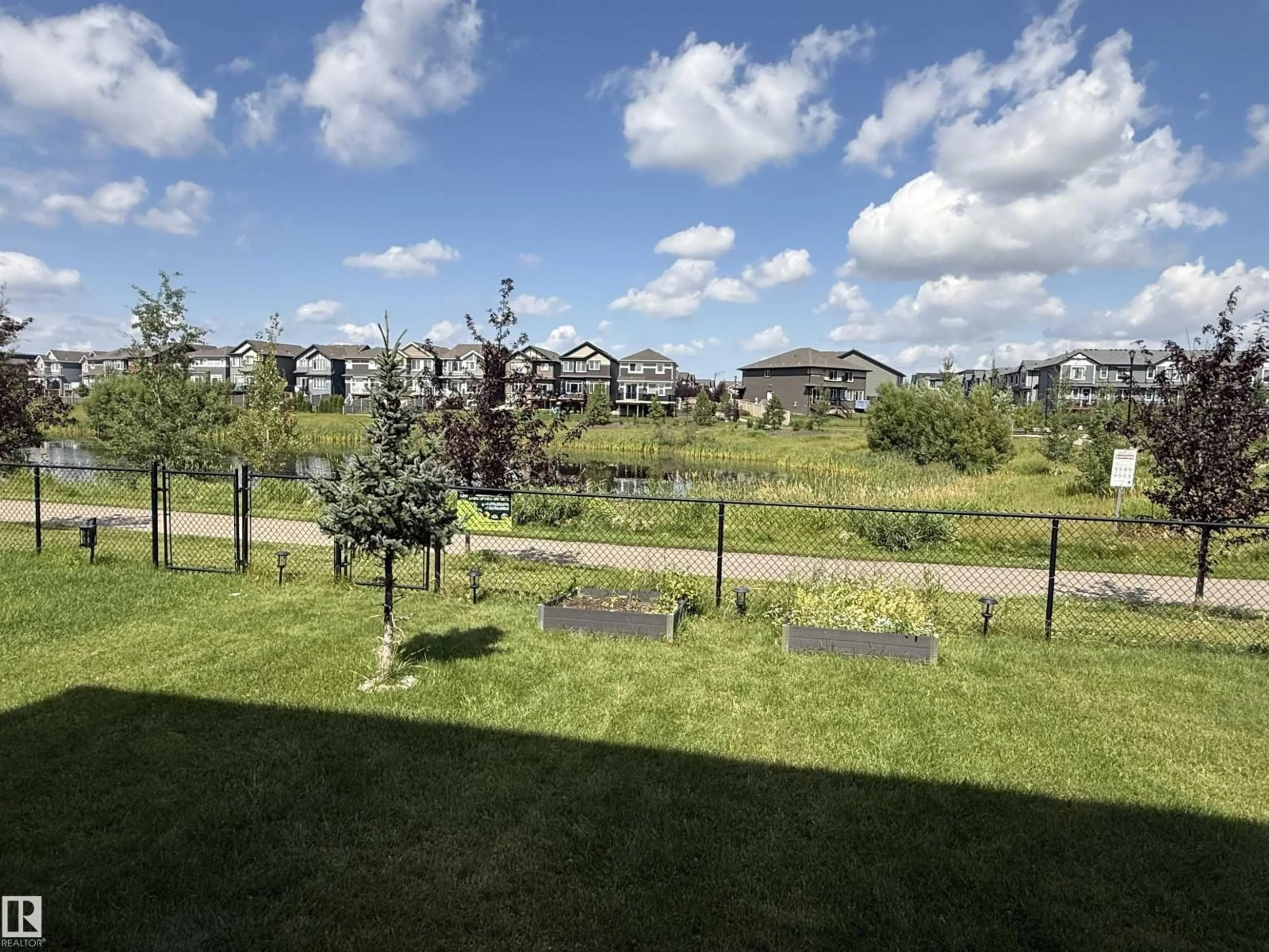 A pic from outside/outdoor area/front of a property/back of a property/a pic from drone, water/lake/river/ocean view for CI SW - 1575 PLUM CIRCLE, Edmonton Alberta T6X2W9