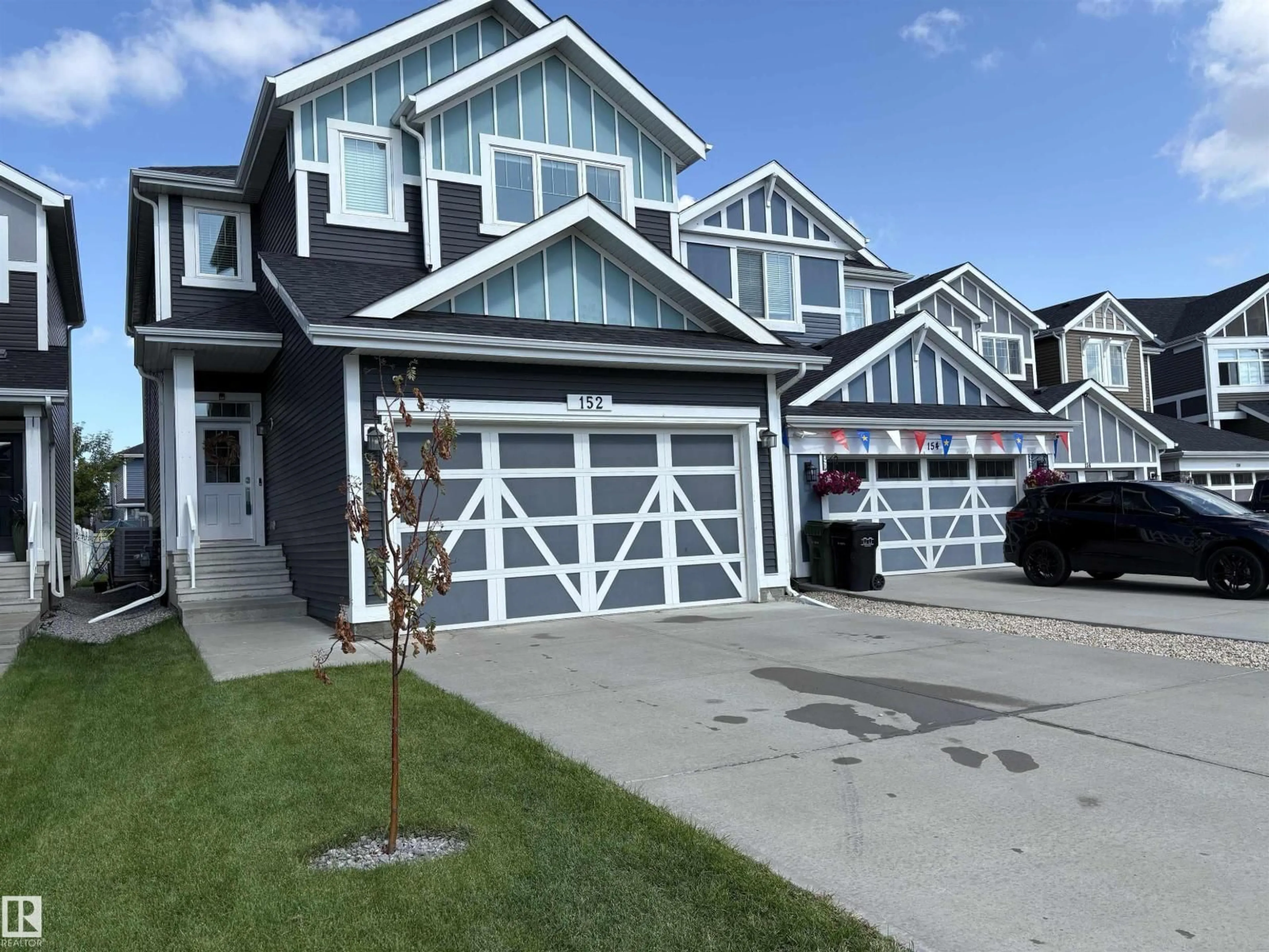 Home with vinyl exterior material, street for 152 STURTZ BN, Leduc Alberta T9E1E3
