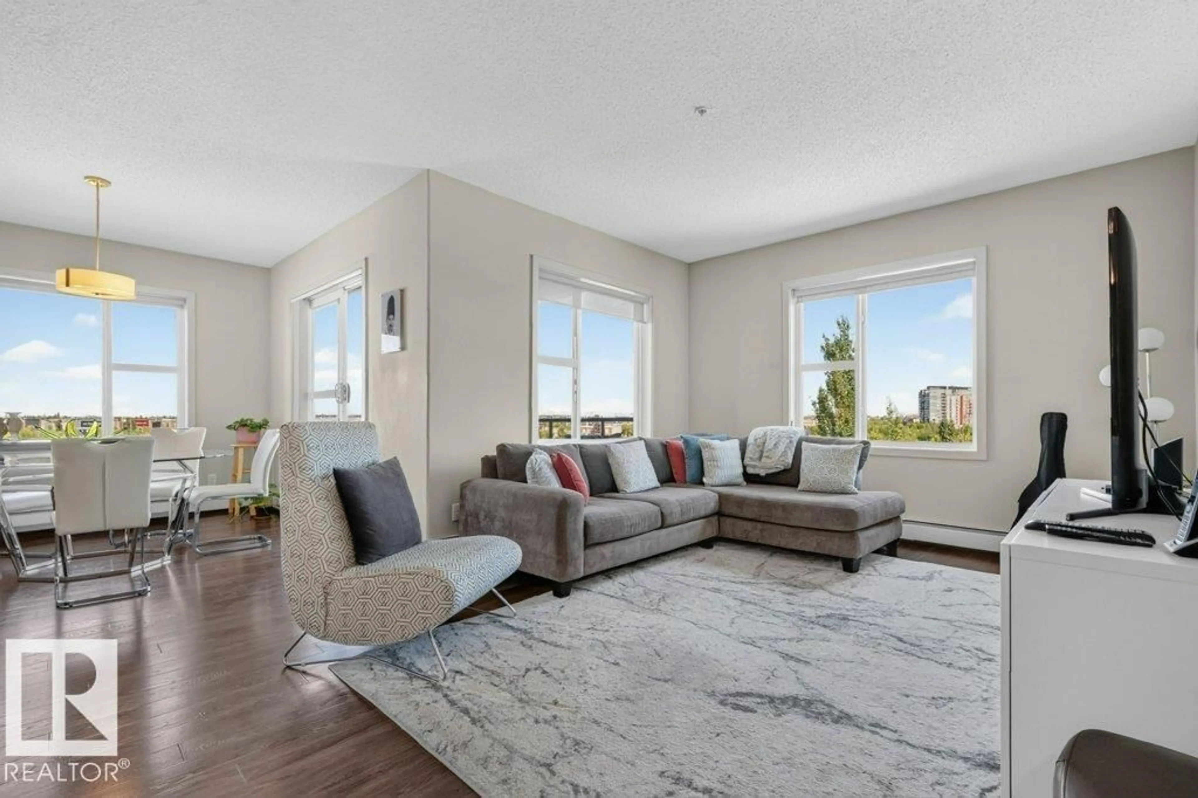Living room with furniture, unknown for 320 - 423 AMBLESIDE LI, Edmonton Alberta T6W2Z9