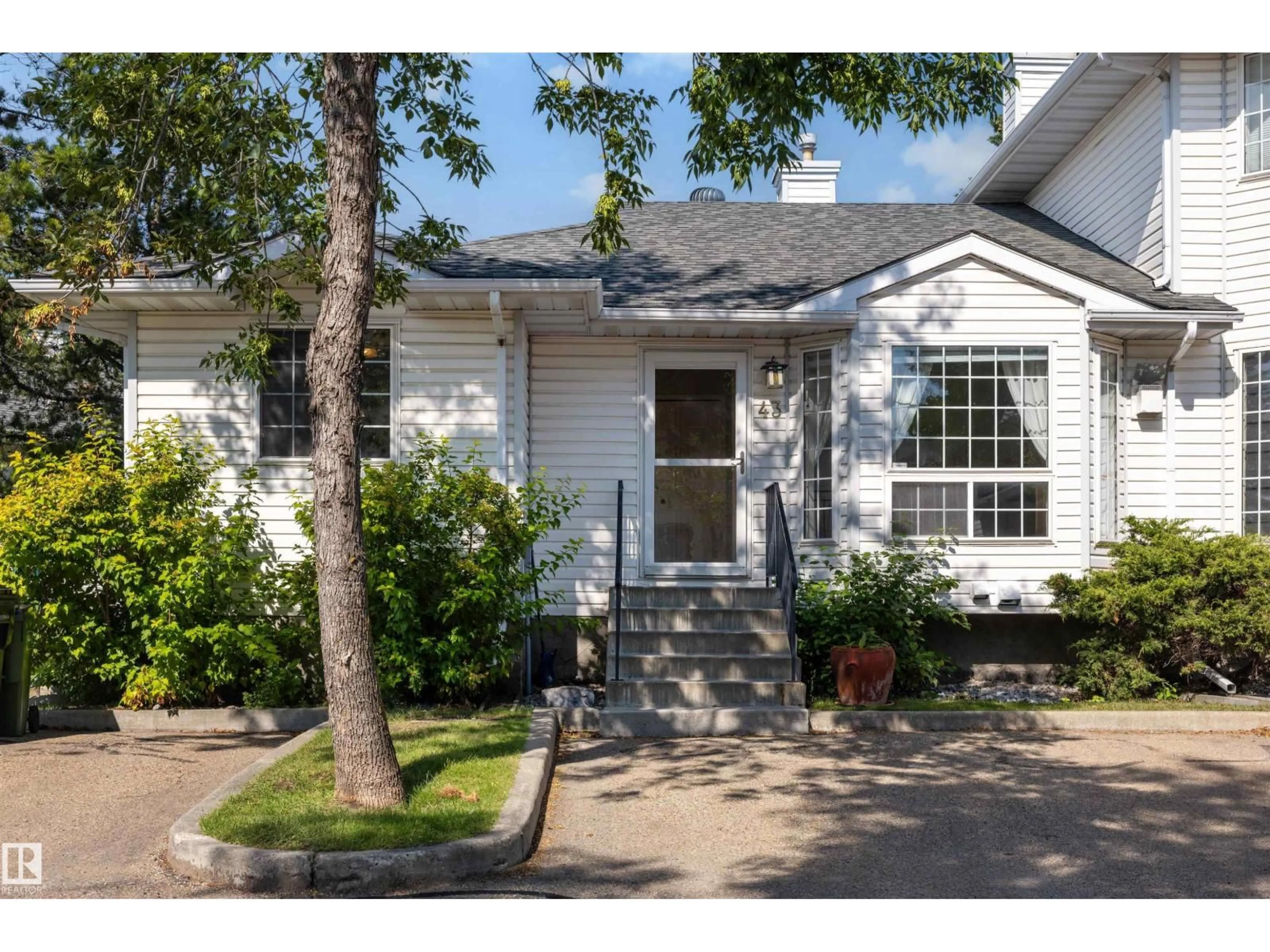 Home with vinyl exterior material, street for 43 - 3311 58 ST, Edmonton Alberta T6L6X3
