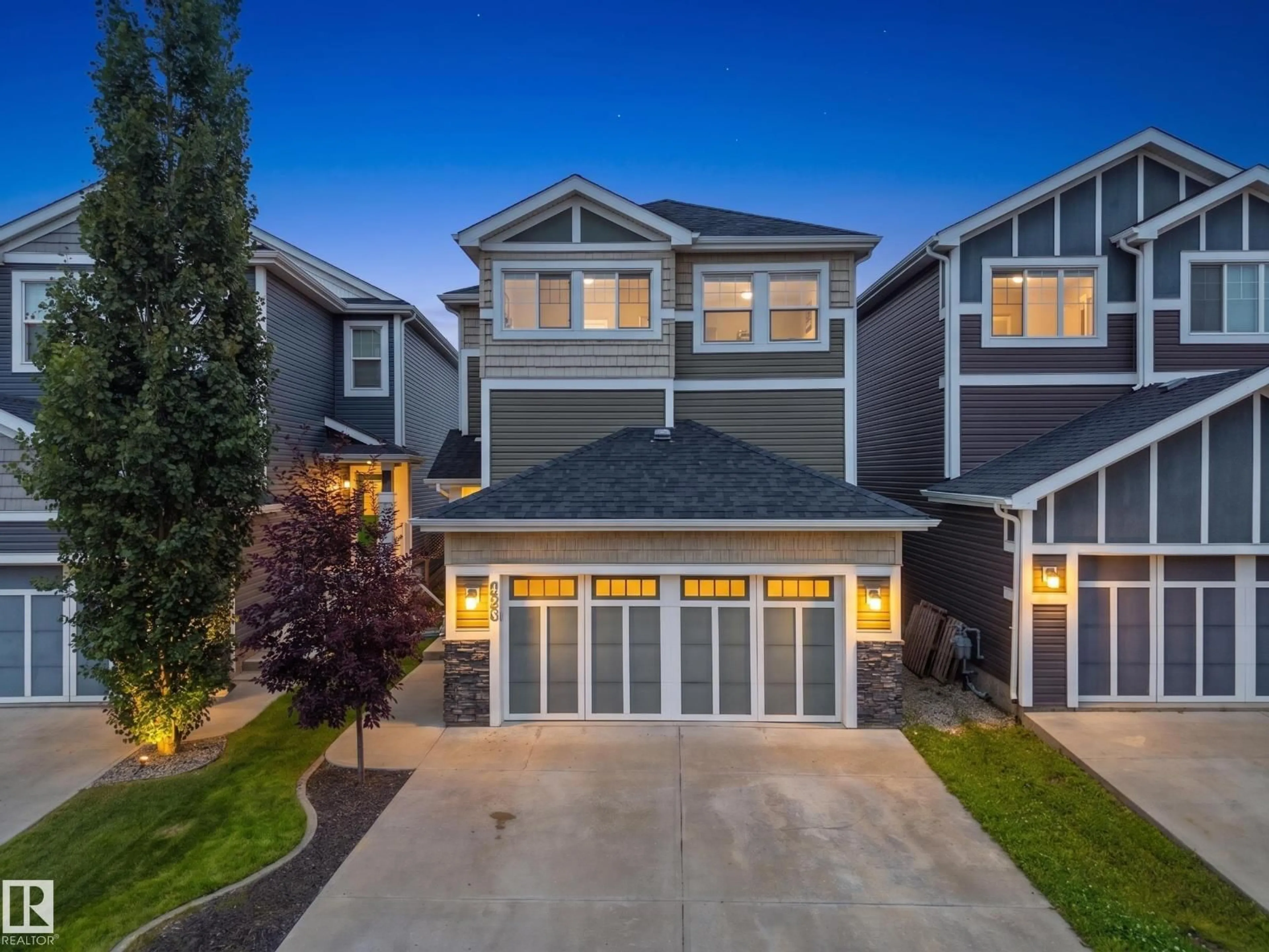 Home with vinyl exterior material, street for 428 SIMPKINS LI, Leduc Alberta T9E1B3