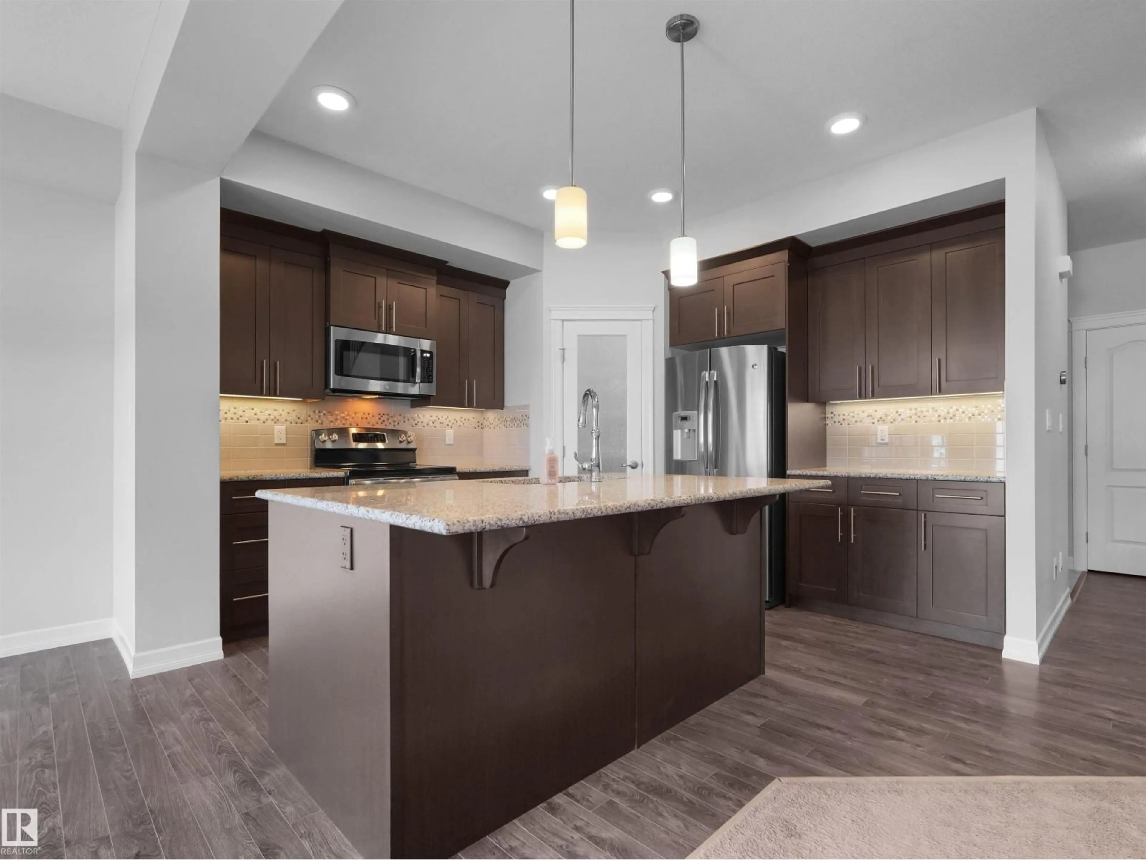 Open concept kitchen, ceramic/tile floor for 428 SIMPKINS LI, Leduc Alberta T9E1B3