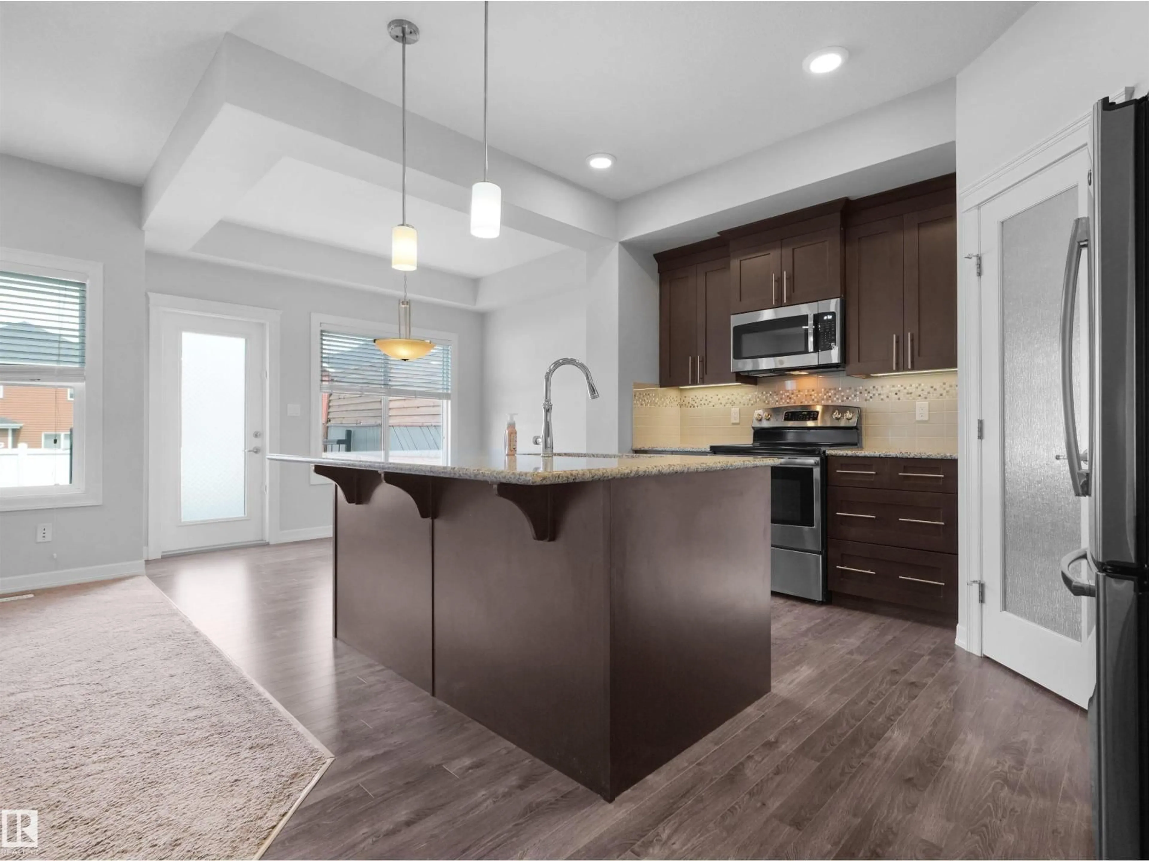 Open concept kitchen, unknown for 428 SIMPKINS LI, Leduc Alberta T9E1B3