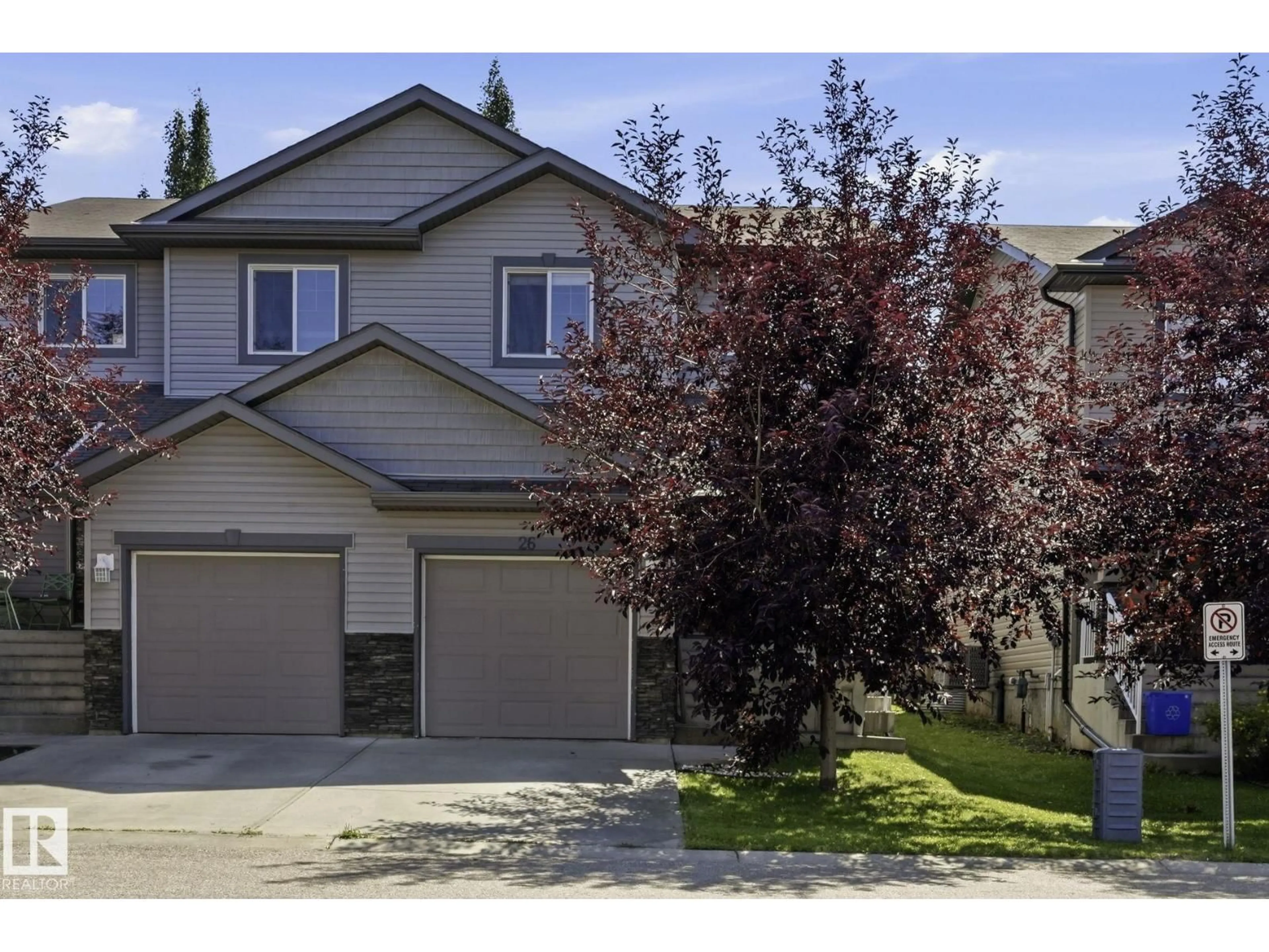 A pic from outside/outdoor area/front of a property/back of a property/a pic from drone, street for 26 85 SPRUCE VILLAGE DR, Spruce Grove Alberta T7X0L2