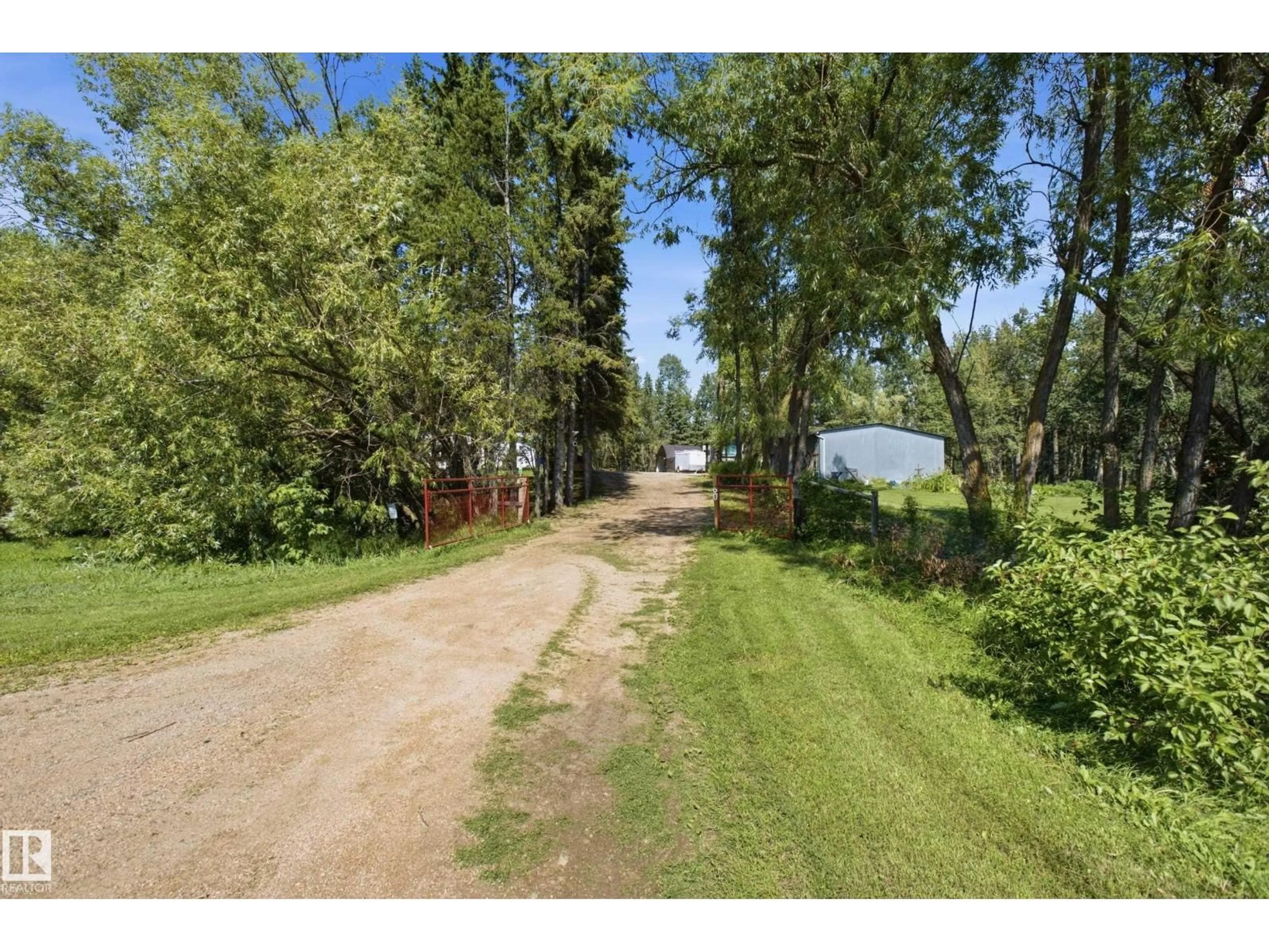 A pic from outside/outdoor area/front of a property/back of a property/a pic from drone, forest/trees view for 60 2304 TWP ROAD 522, Rural Parkland County Alberta T0E0H0