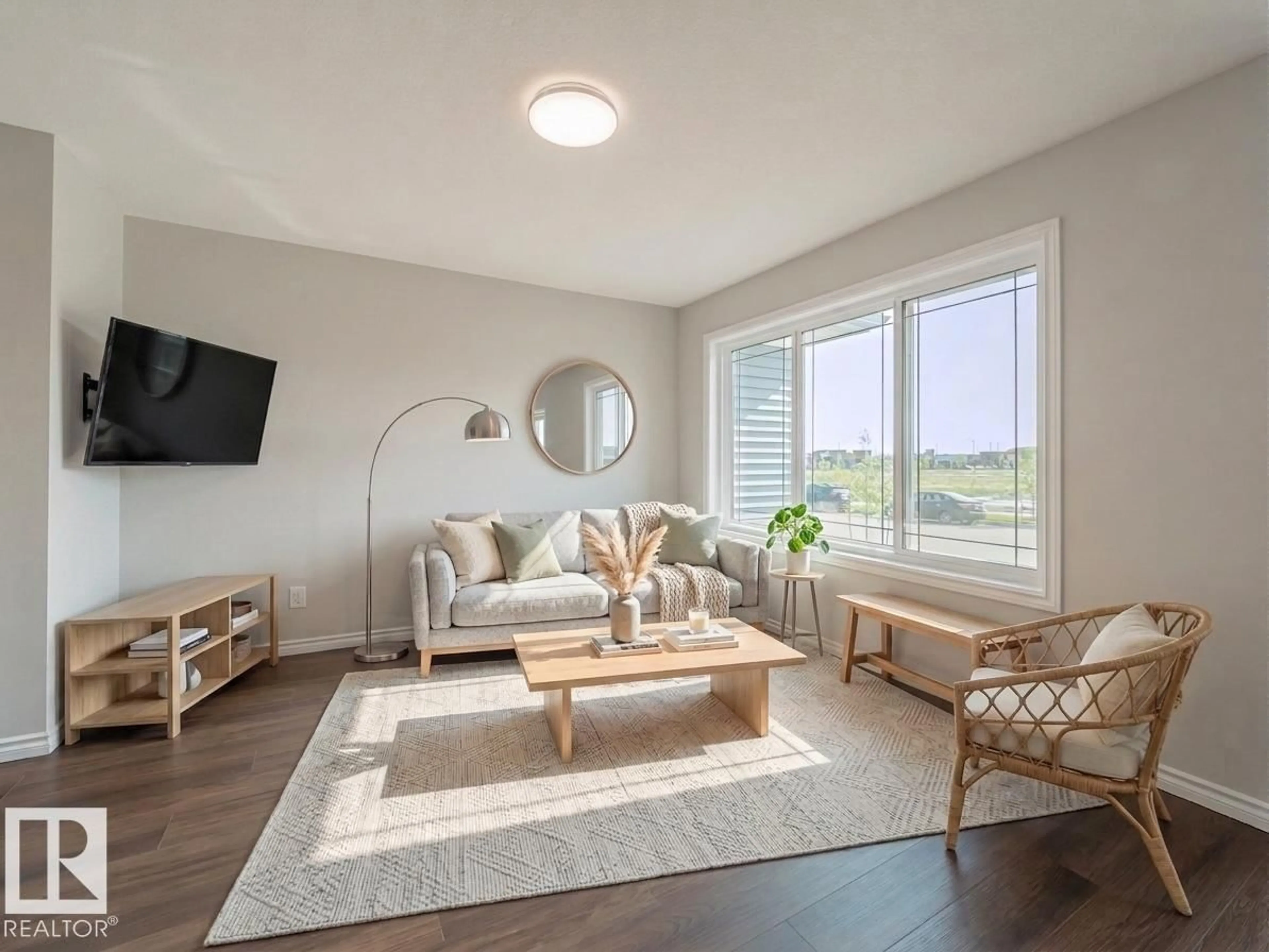 Living room with furniture, wood/laminate floor for NW - 17662 69A ST, Edmonton Alberta T5Z0X8