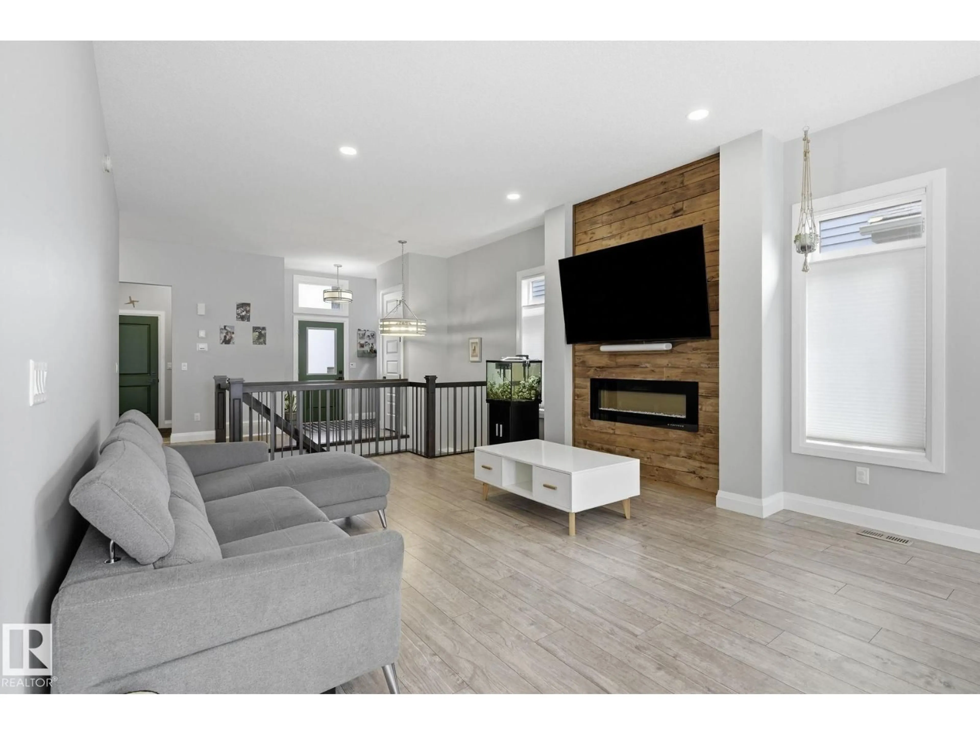 Living room with furniture, wood/laminate floor for 17 KINGSBURY CI, Spruce Grove Alberta T7X0C9