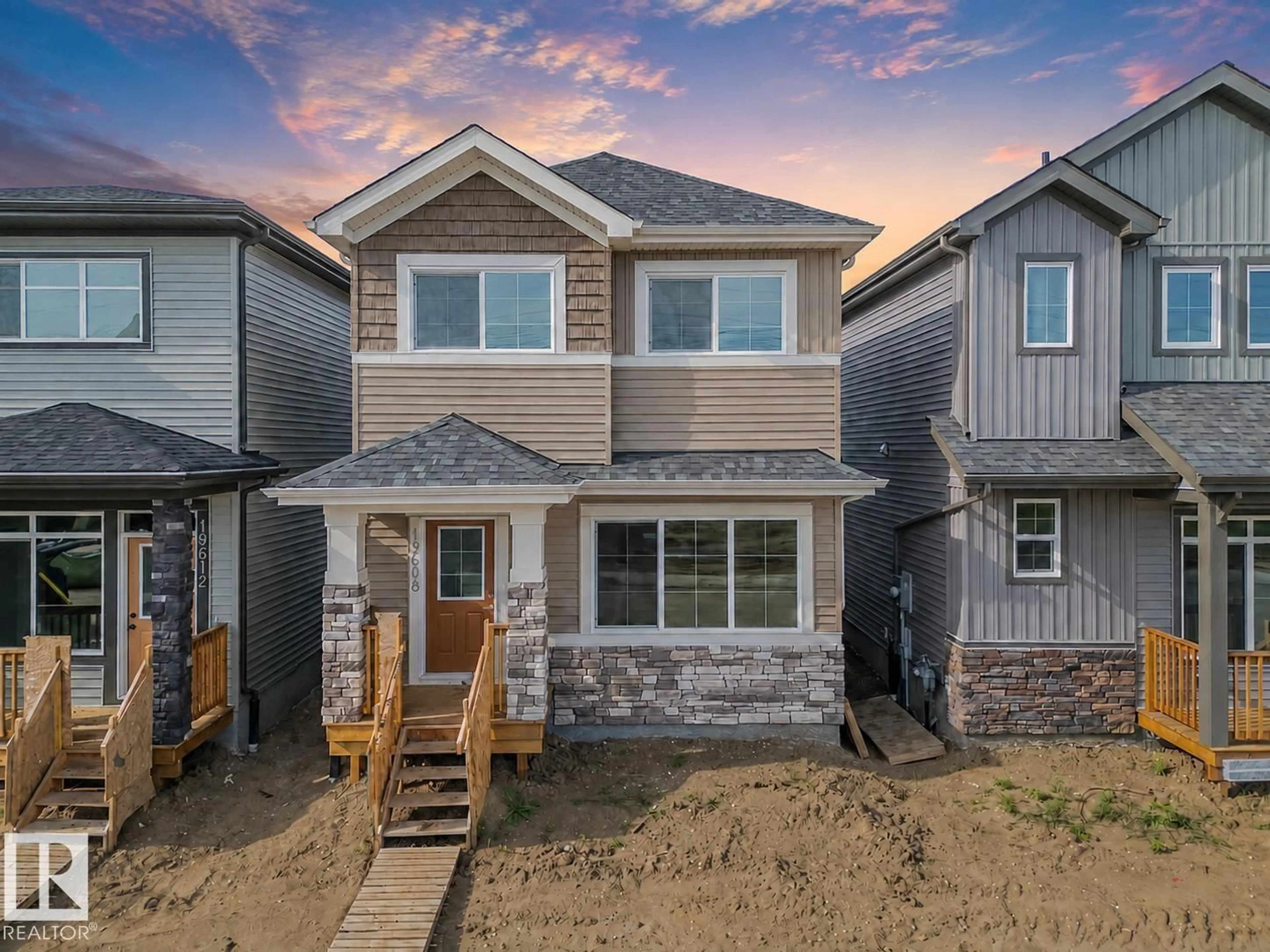 Home with vinyl exterior material, street for 19608 30 AV, Edmonton Alberta T6M3L9