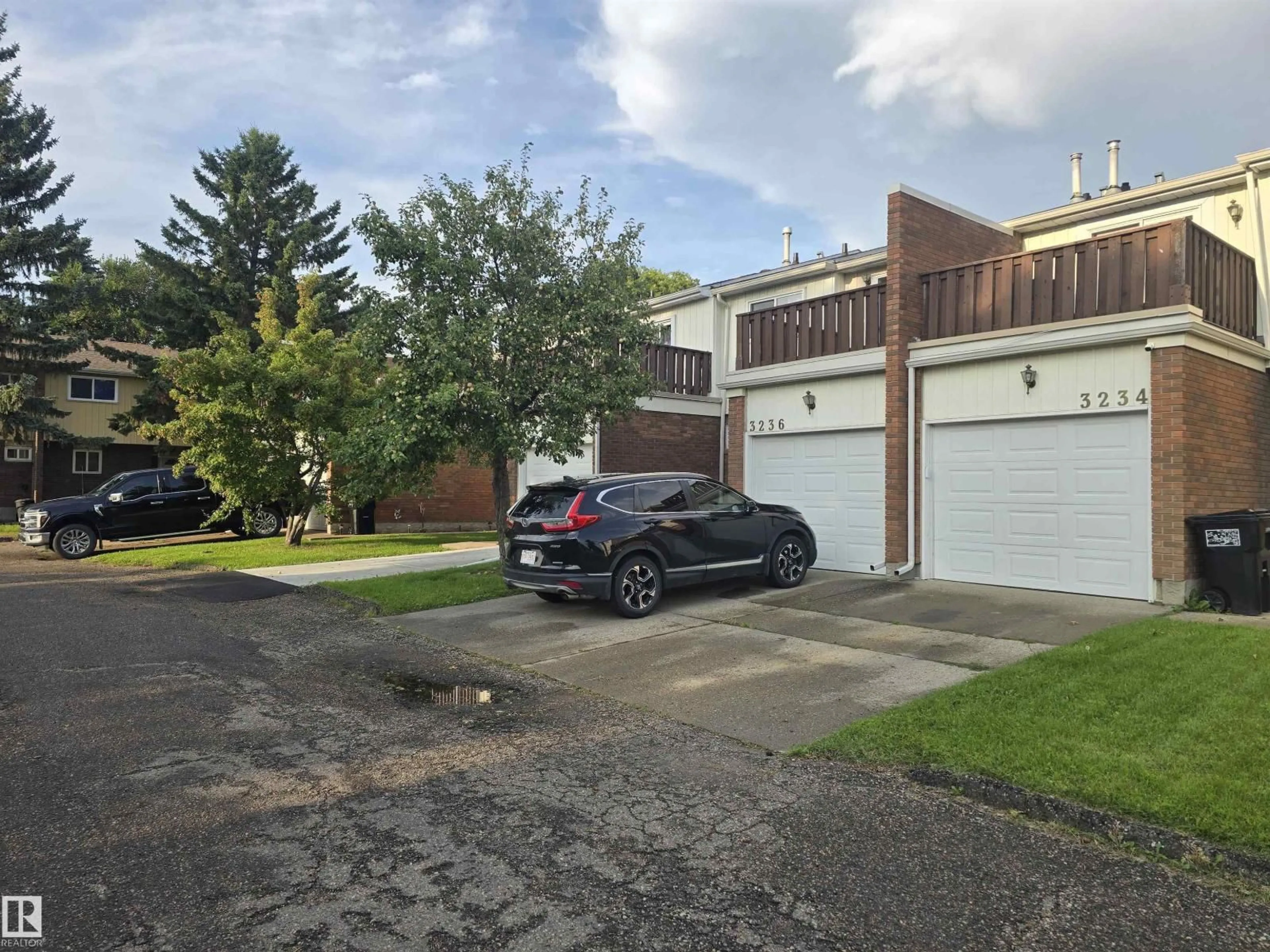 A pic from outside/outdoor area/front of a property/back of a property/a pic from drone, street for NW - 3236 130A AV, Edmonton Alberta T5A3K3