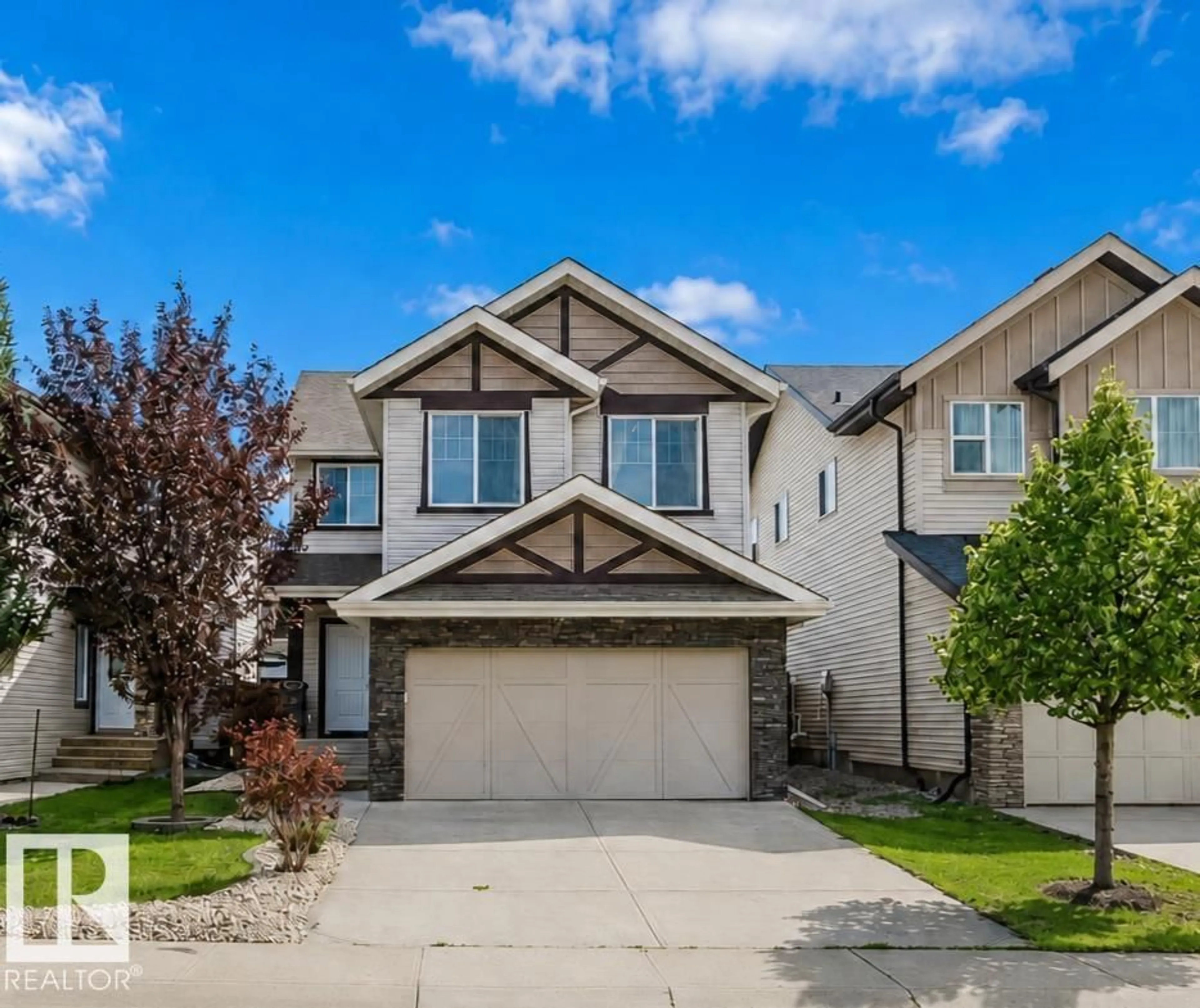 Home with vinyl exterior material, street for 15839 10 AV, Edmonton Alberta T6W2H2