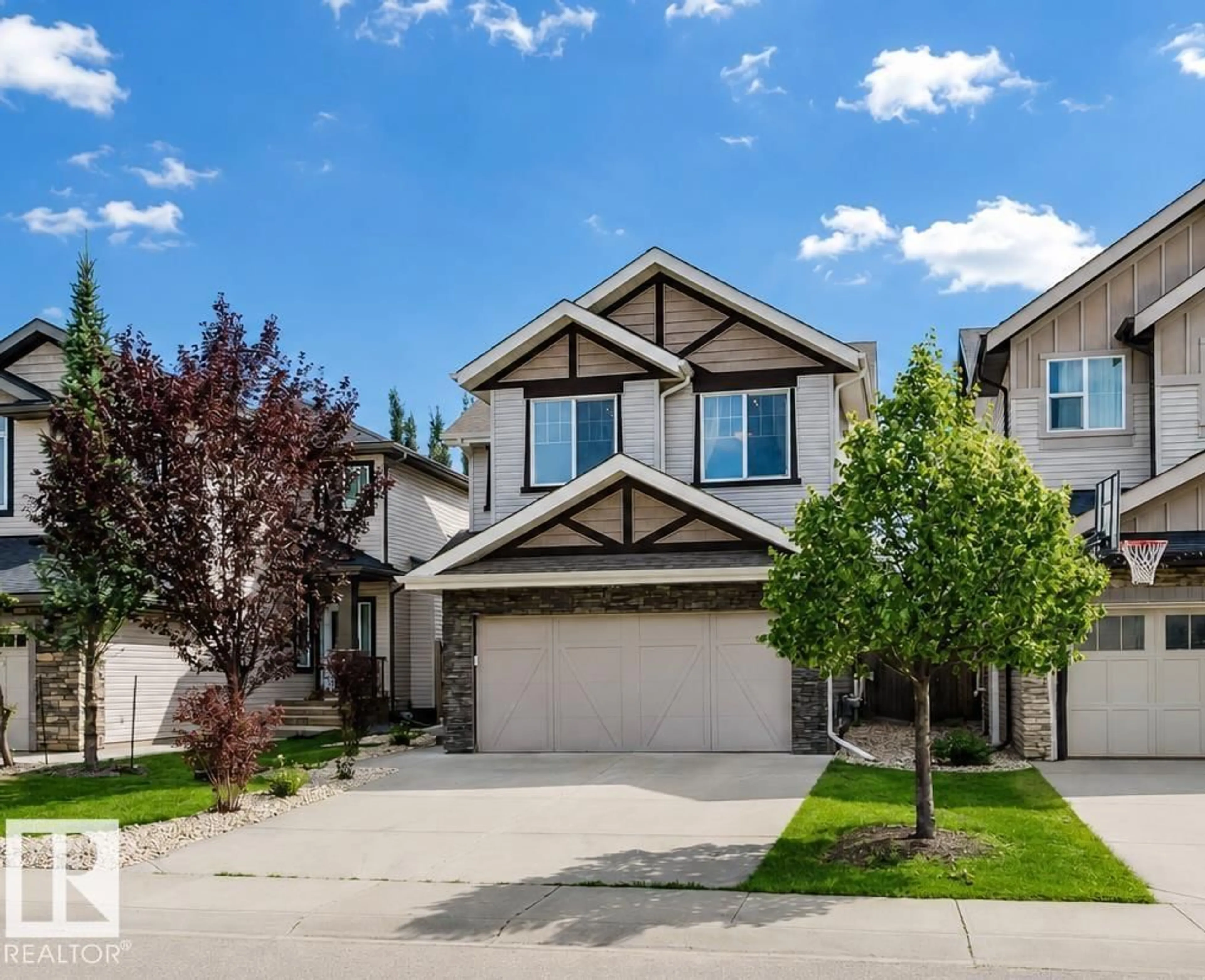 Home with vinyl exterior material, street for 15839 10 AV, Edmonton Alberta T6W2H2