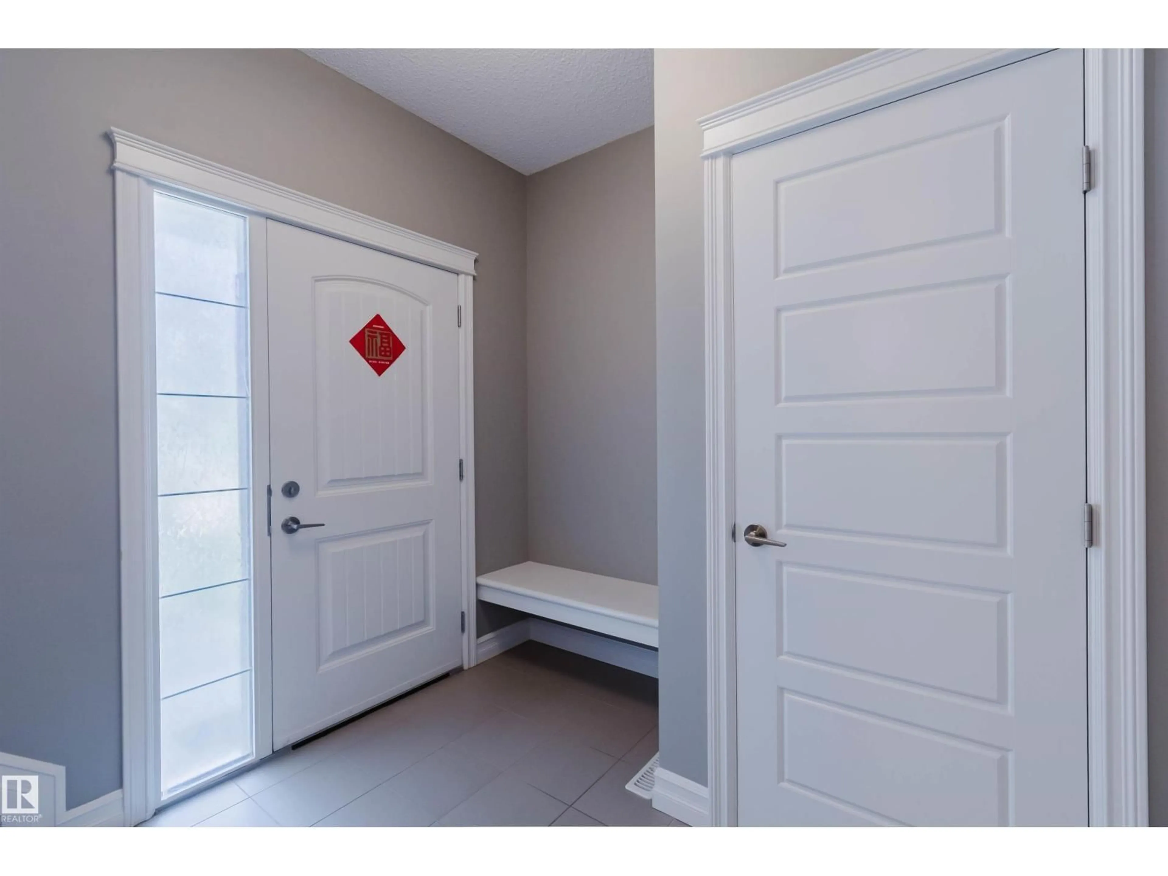 Indoor entryway for 15839 10 AV, Edmonton Alberta T6W2H2