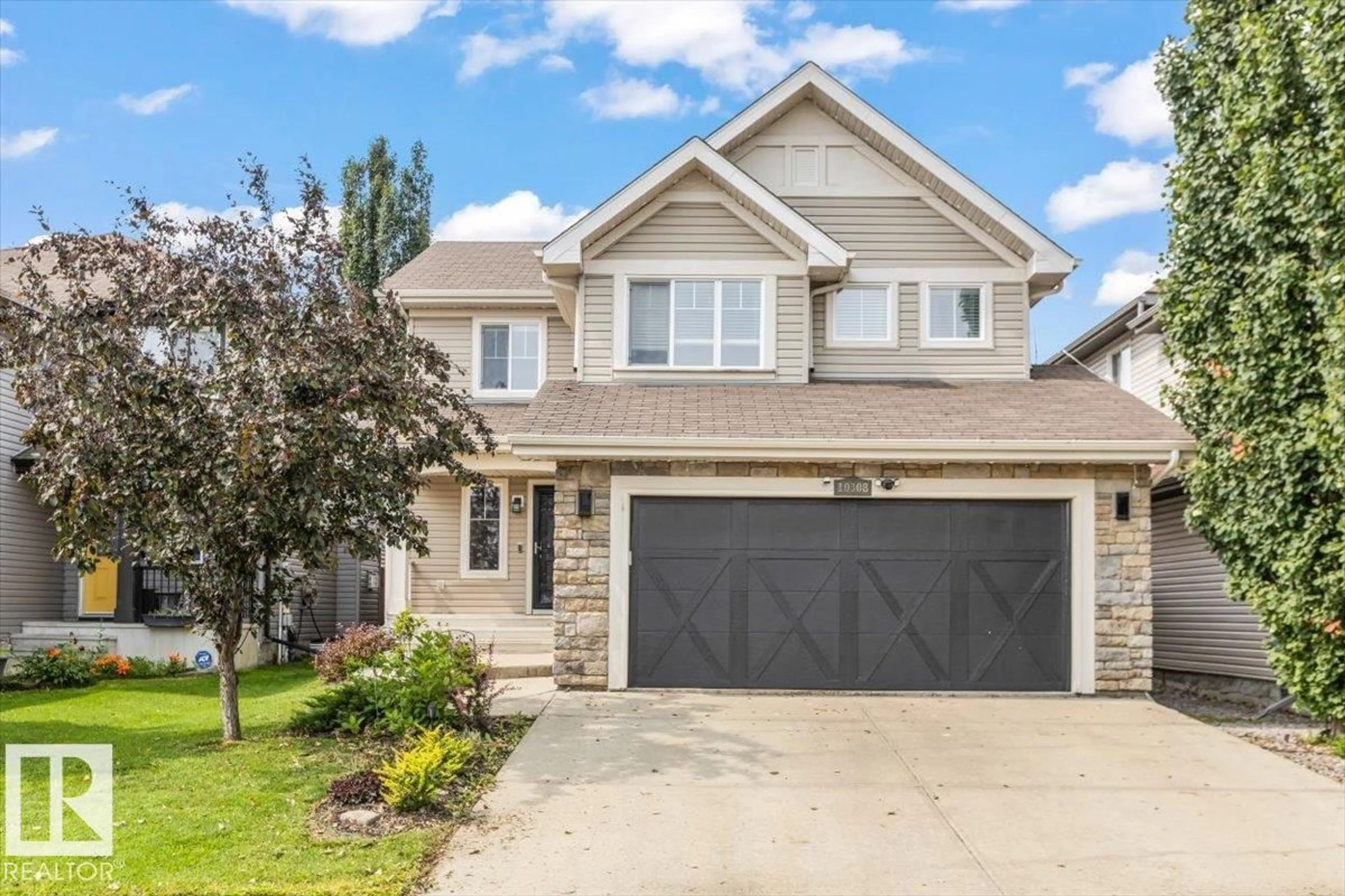 Home with vinyl exterior material, street for 10308 96 ST, Morinville Alberta T8R0B4