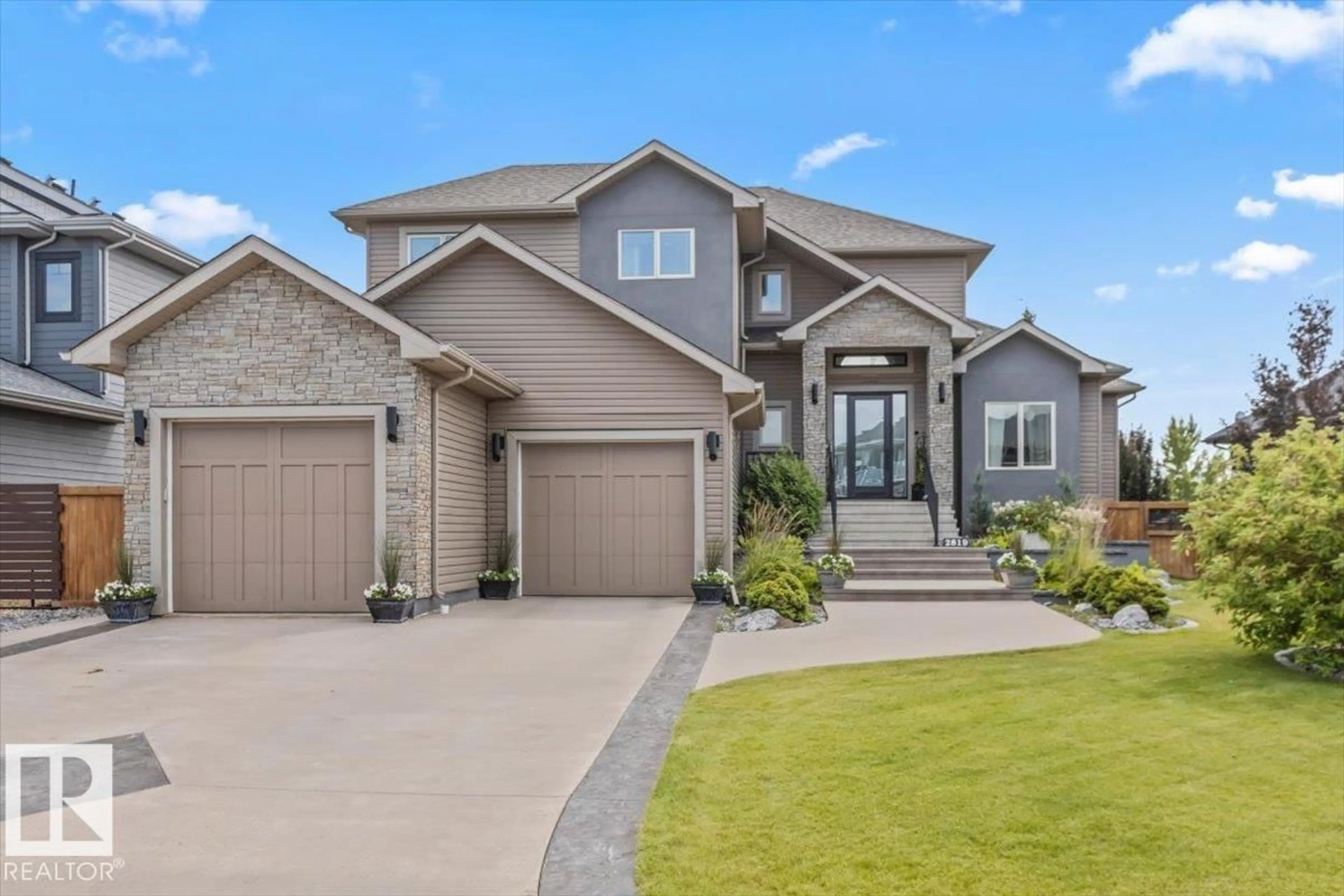Home with brick exterior material, street for 2819 59 AV, Rural Leduc County Alberta T4X0X5