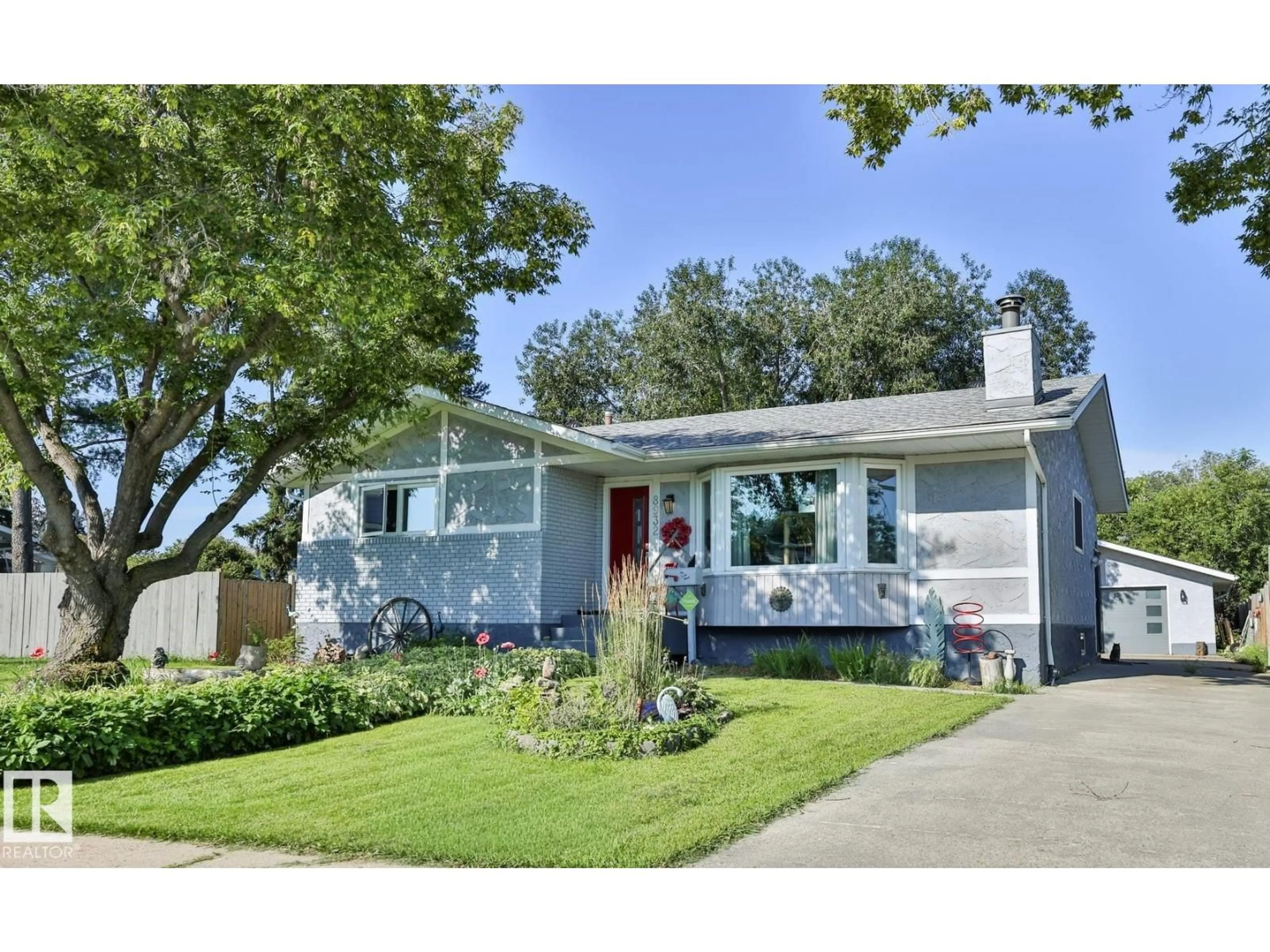 Home with vinyl exterior material, street for NW - 8932 187 ST, Edmonton Alberta T5T1S1