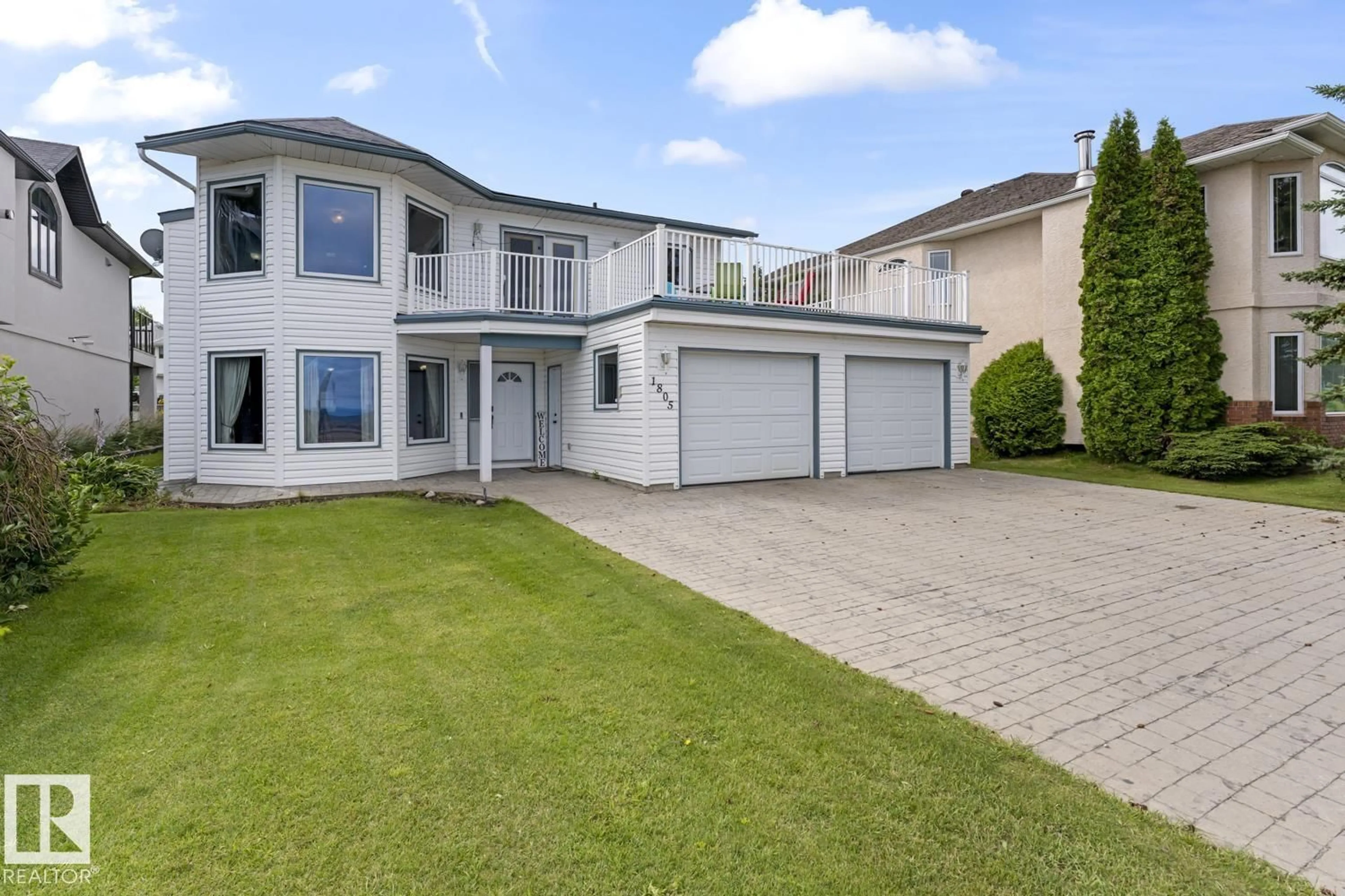 A pic from outside/outdoor area/front of a property/back of a property/a pic from drone, street for 1805 1 AV, Cold Lake Alberta T9M1B5