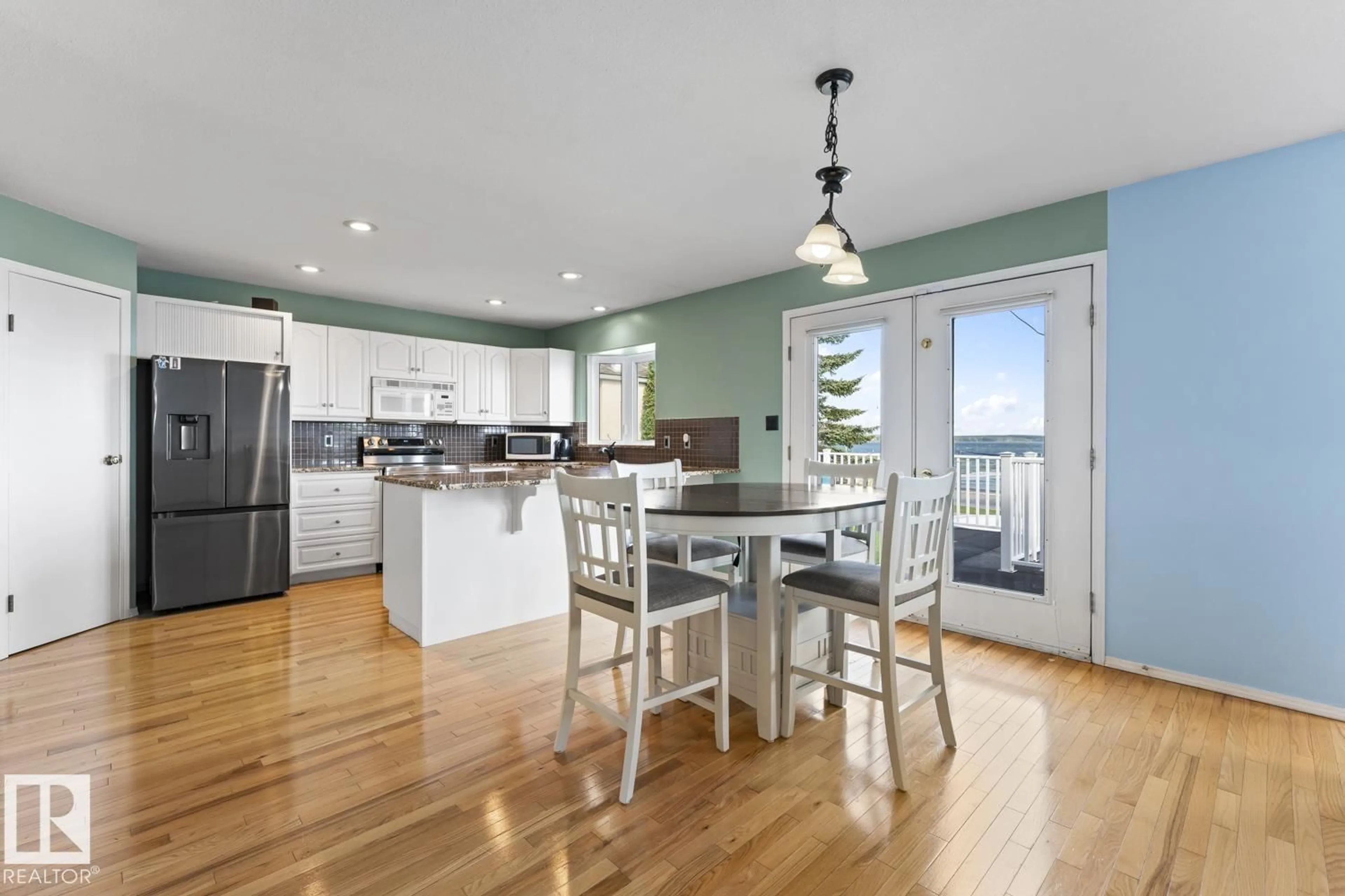 Open concept kitchen, wood/laminate floor for 1805 1 AV, Cold Lake Alberta T9M1B5