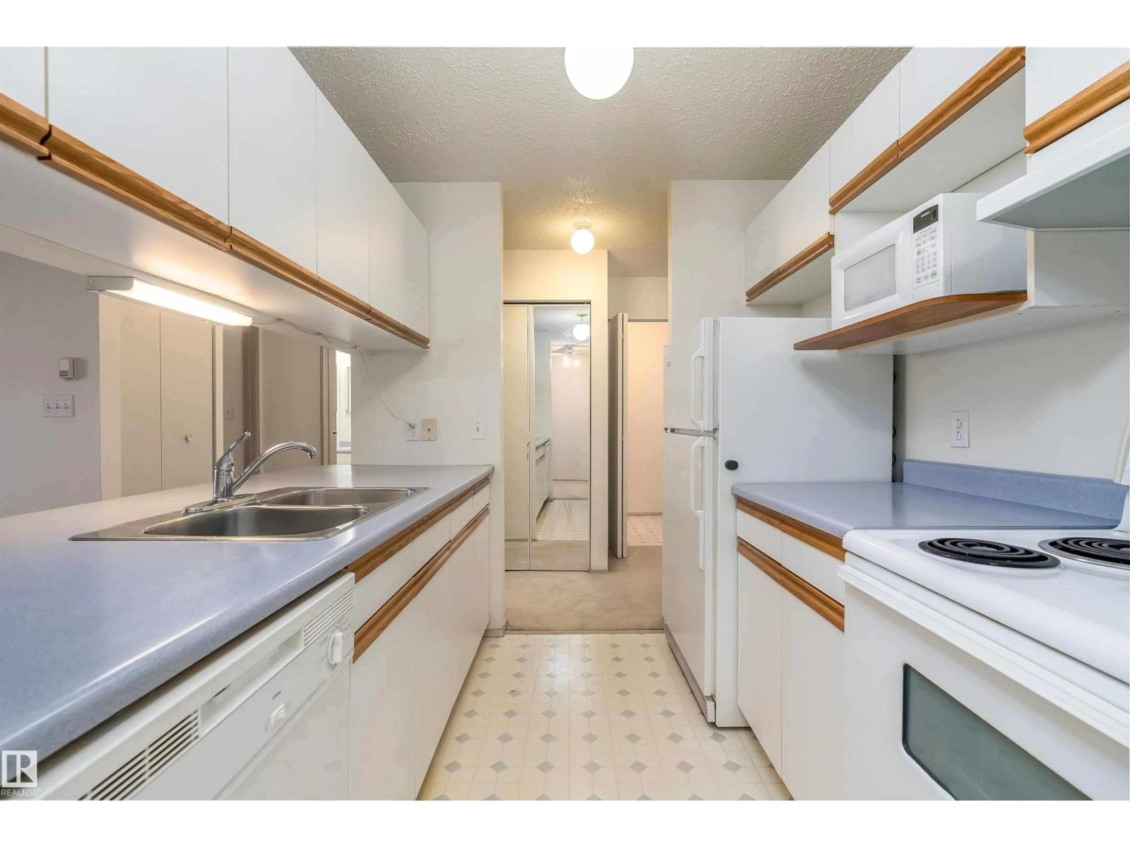 Standard kitchen, unknown for 306 - 4220 139 AV NW, Edmonton Alberta T5Y2Y2