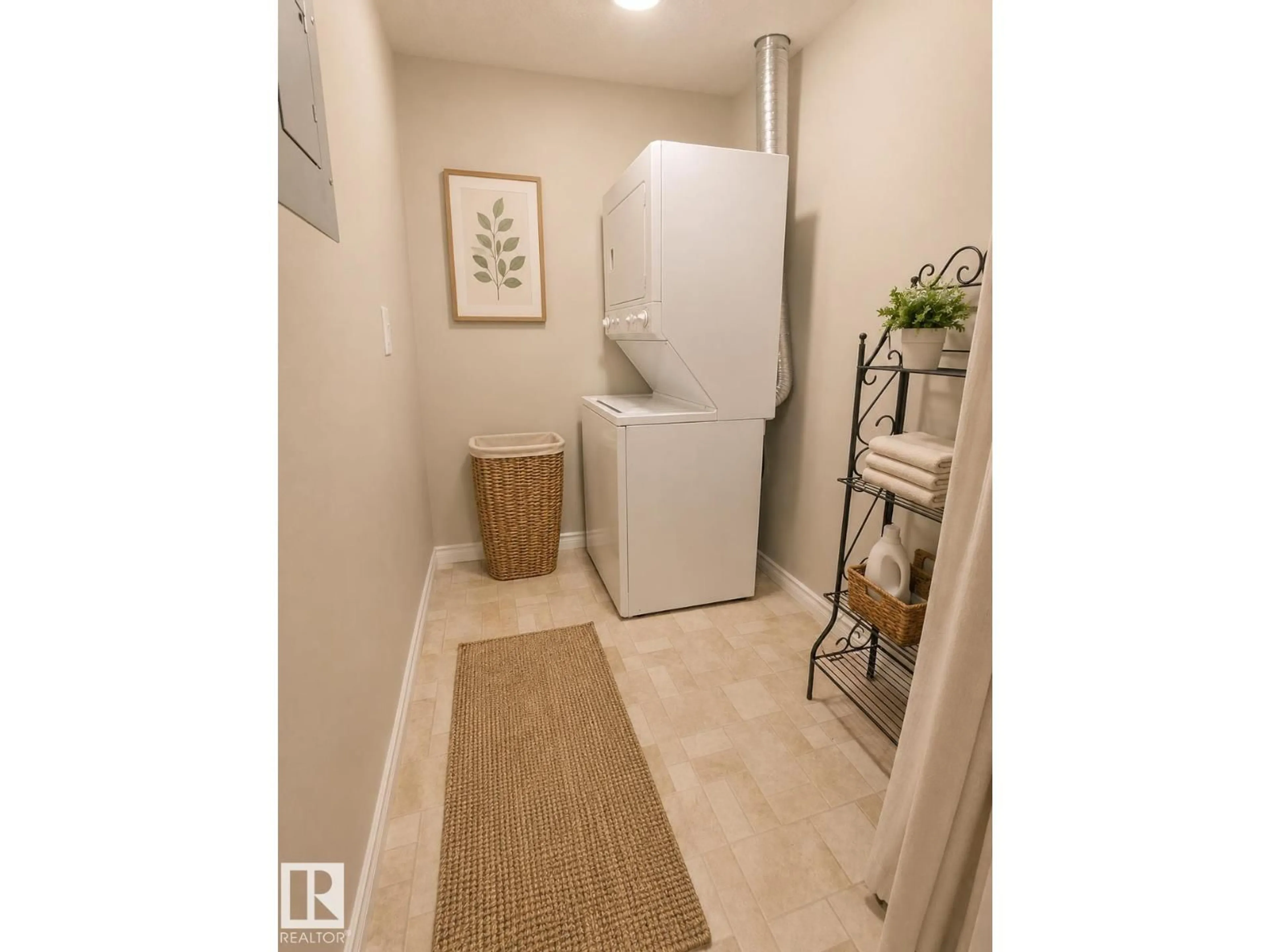 Laundry room for 16715 100 AV, Edmonton Alberta T5P4Z5