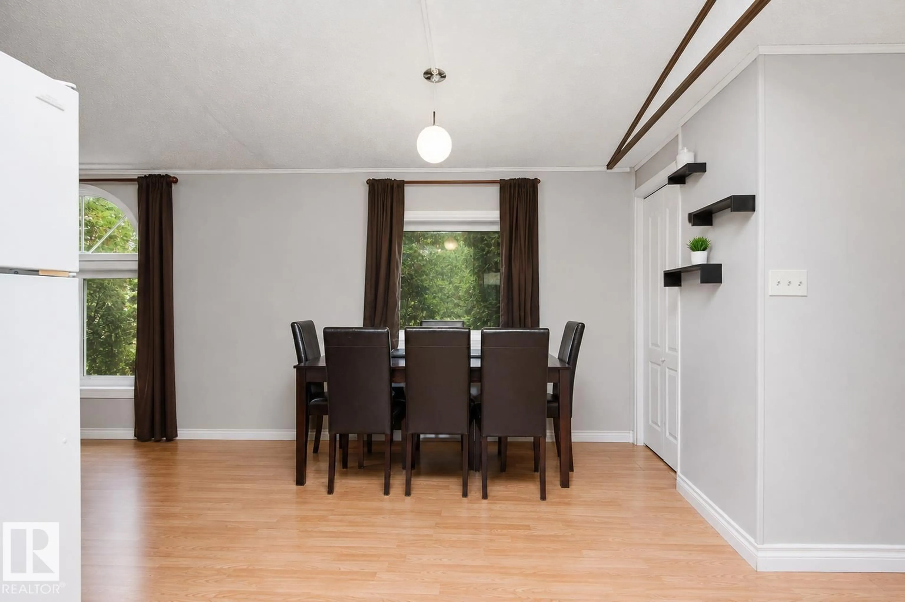 Dining room, wood/laminate floor for 62418 RR 442, Rural Bonnyville M.D. Alberta T9N2H6