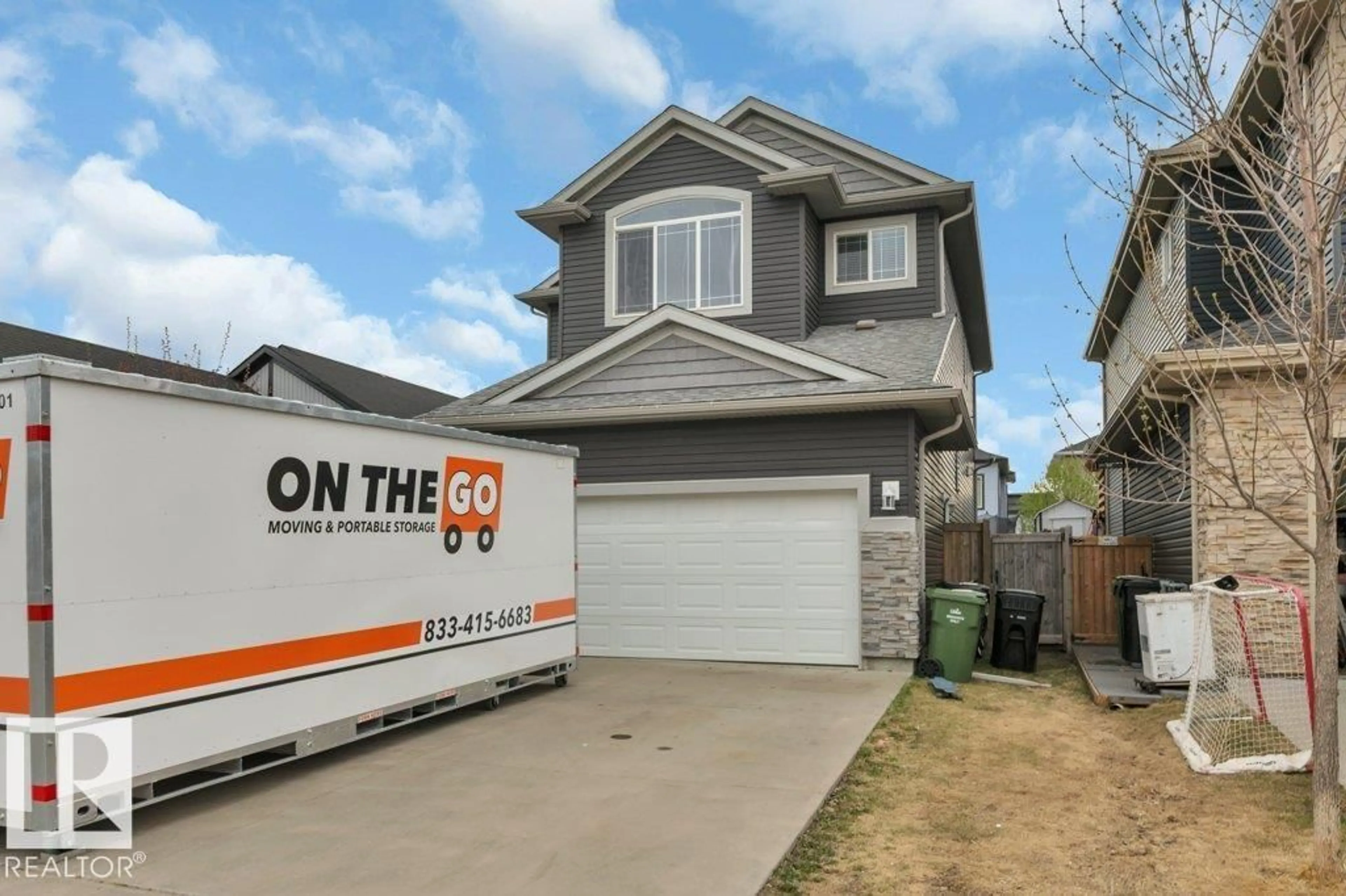 Home with vinyl exterior material, street for 155 KIRPATRICK CR, Leduc Alberta T9E0W3