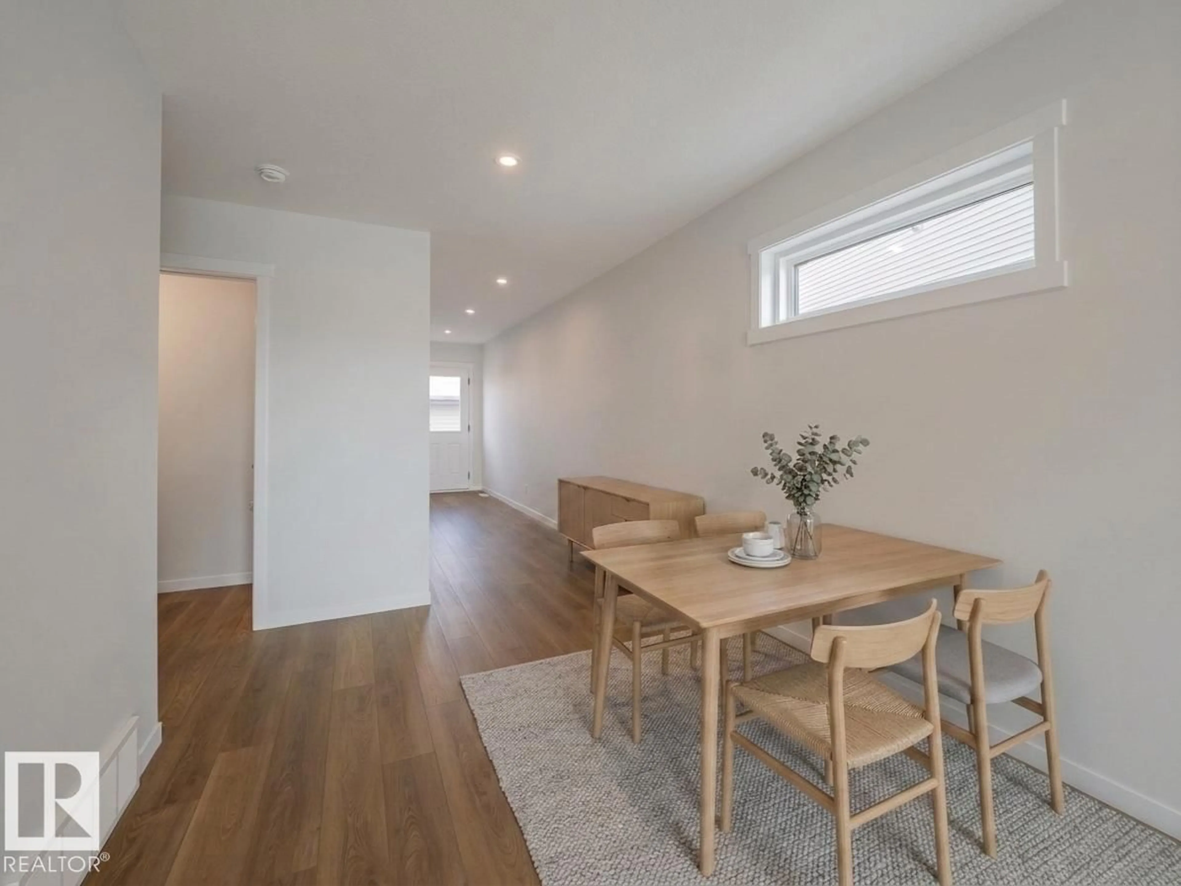 Dining room, wood/laminate floor for NW - 17218 4 ST, Edmonton Alberta T5Y4K9