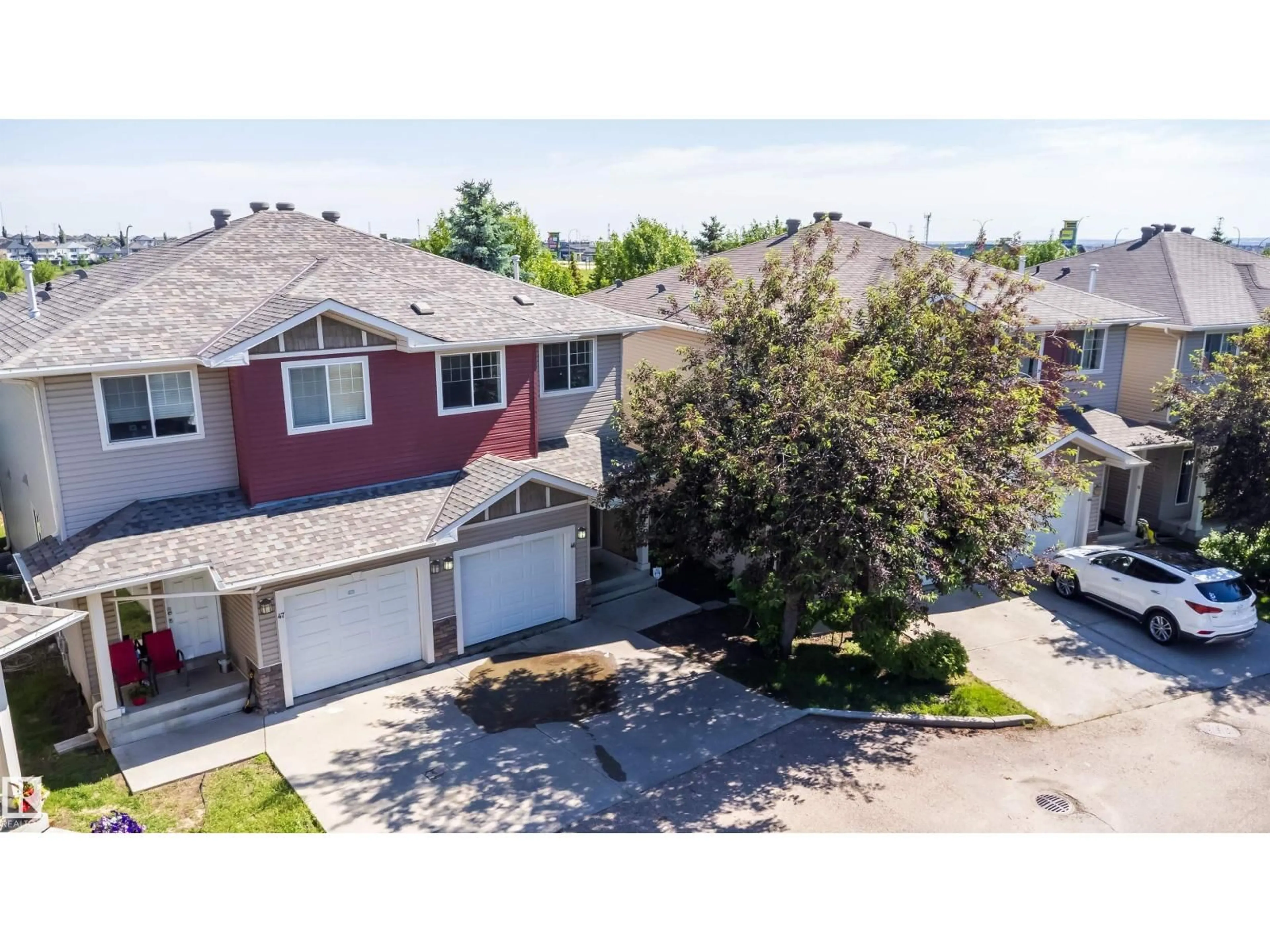 A pic from outside/outdoor area/front of a property/back of a property/a pic from drone, street for 46 15151 43 ST NW, Edmonton Alberta T5Y0L3