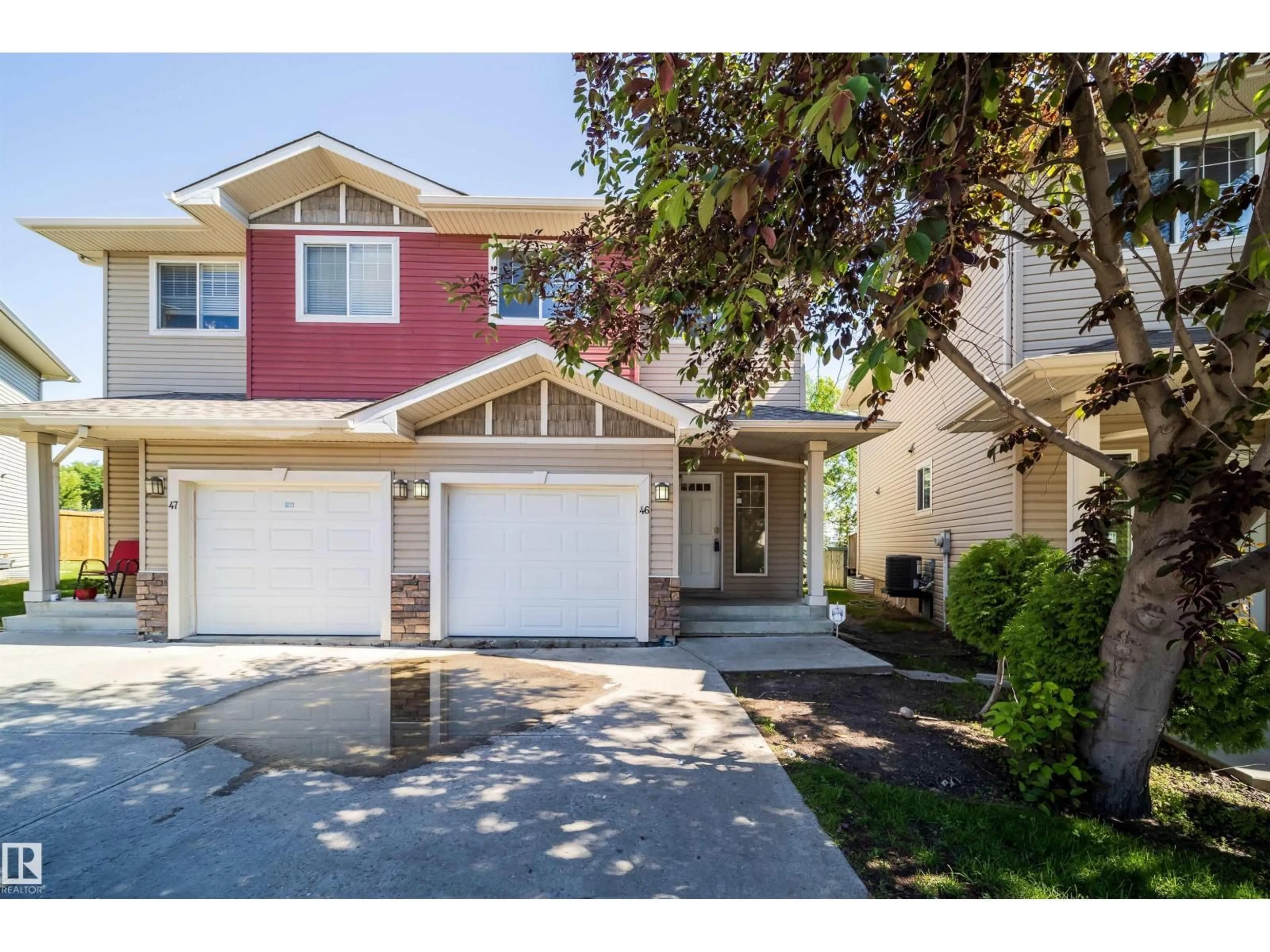 Home with vinyl exterior material, street for 46 15151 43 ST NW, Edmonton Alberta T5Y0L3